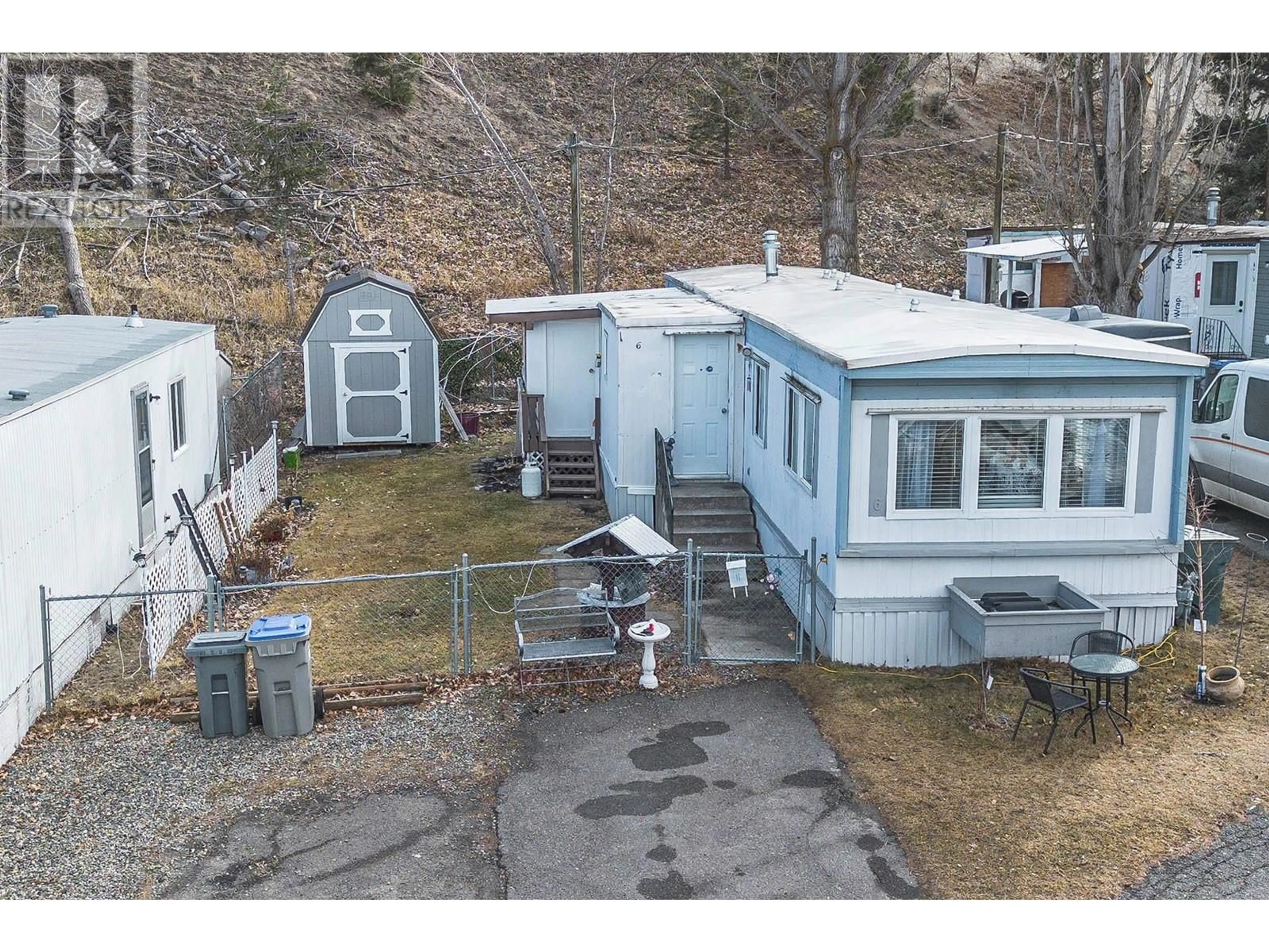 A pic from outside/outdoor area/front of a property/back of a property/a pic from drone, unknown for 6 - 1175 ROSE HILL ROAD, Kamloops British Columbia V2E1G9