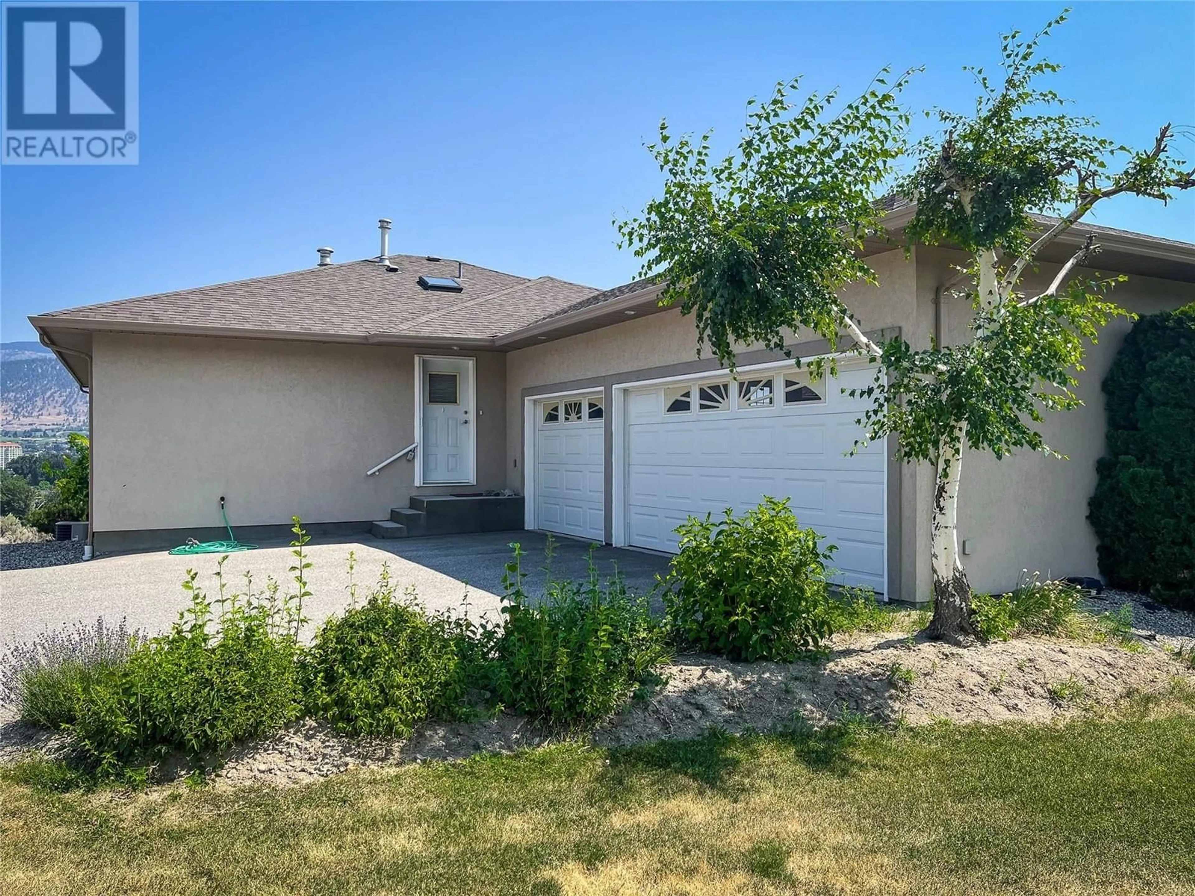 Home with vinyl exterior material, street for 398 RIDGE ROAD, Penticton British Columbia V2A8N7