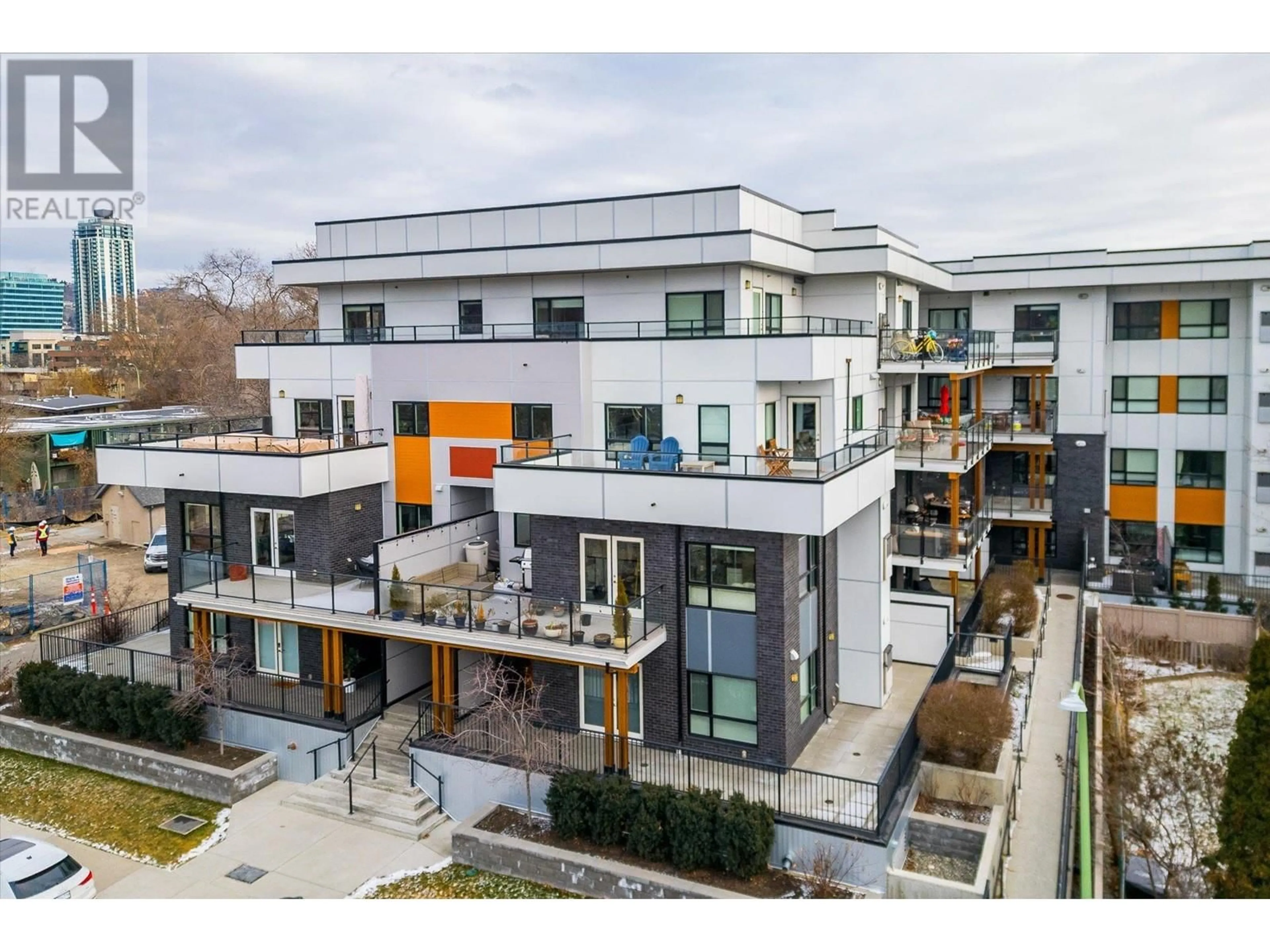 A pic from outside/outdoor area/front of a property/back of a property/a pic from drone, unknown for 105 - 1883 WATER STREET, Kelowna British Columbia V1Y1K4