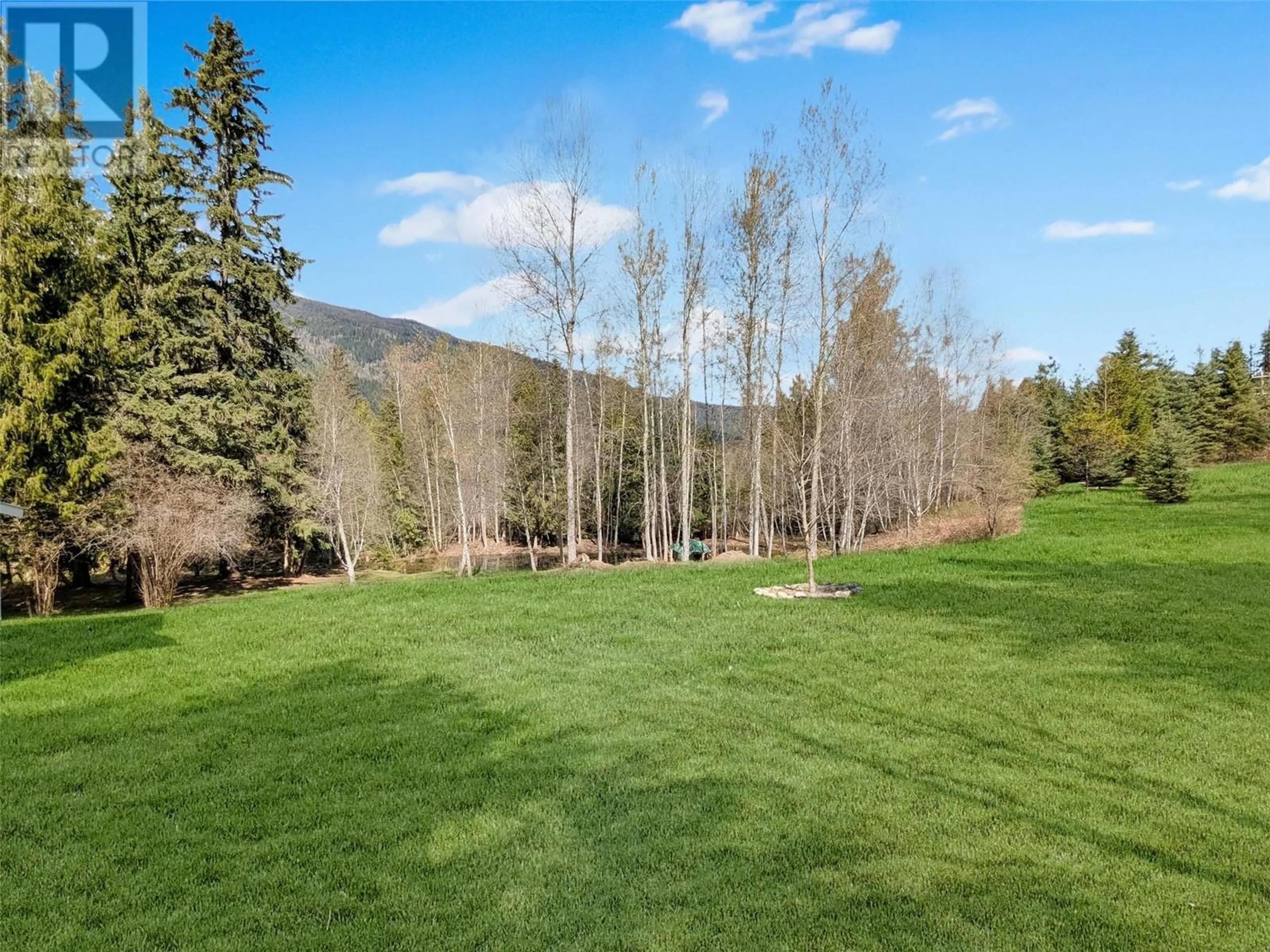 A pic from outside/outdoor area/front of a property/back of a property/a pic from drone, forest/trees view for 6685 6 HIGHWAY, Appledale British Columbia V0G2J0
