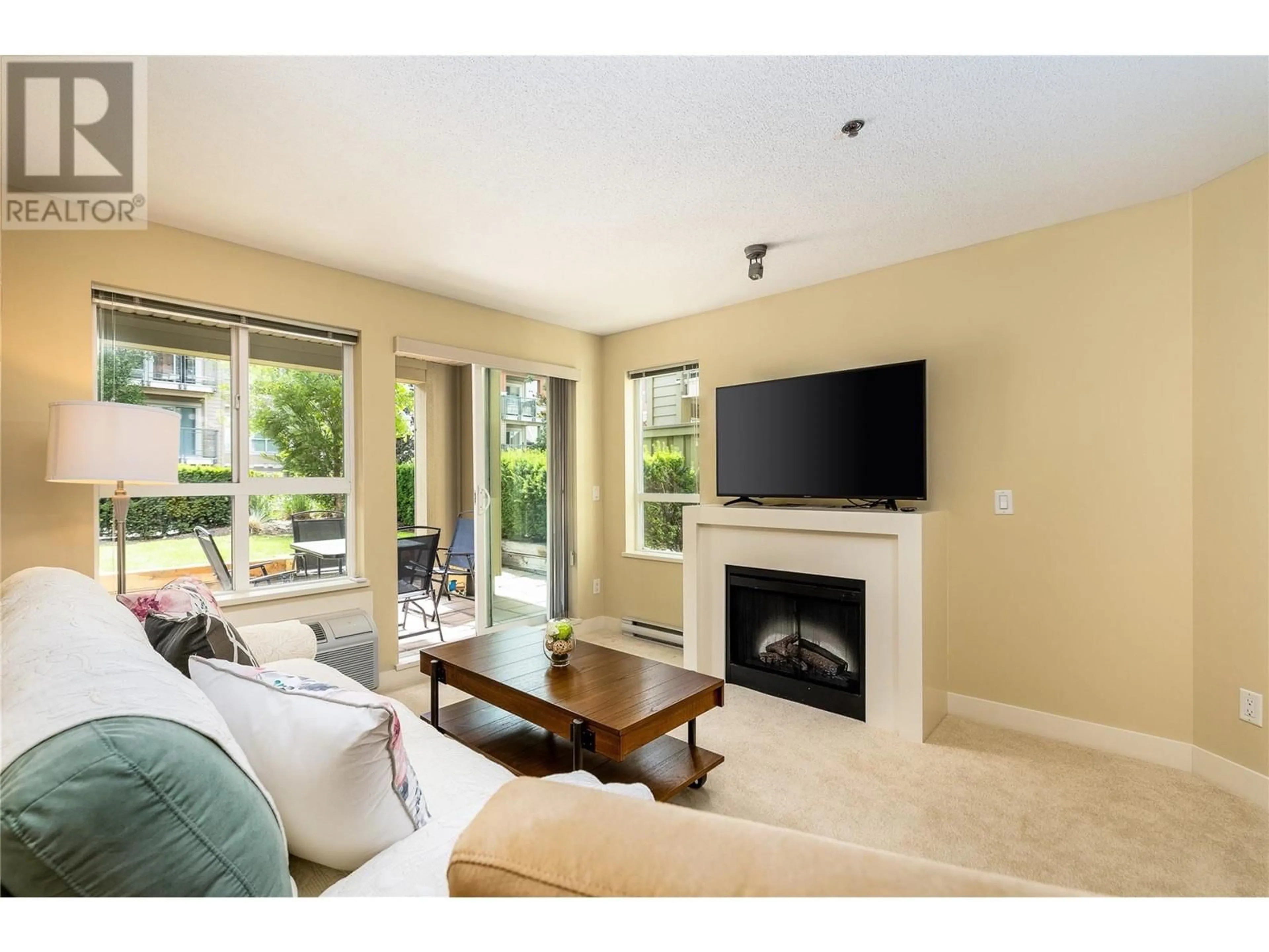 Living room with furniture, unknown for 103 - 1093 SUNSET DRIVE, Kelowna British Columbia V1Y9Z3