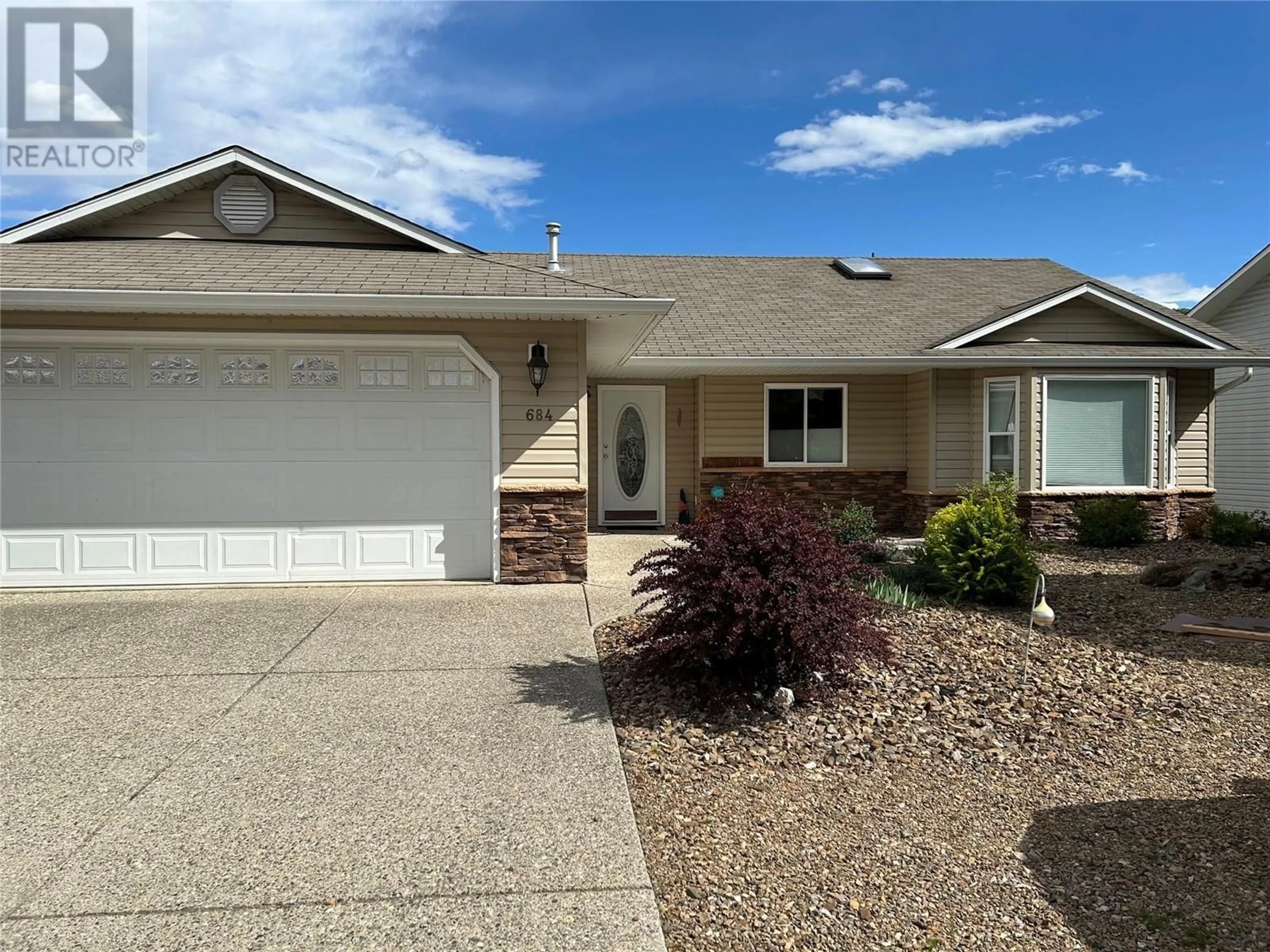 Home with vinyl exterior material, street for 684 6 STREET, Vernon British Columbia V1H1Z1