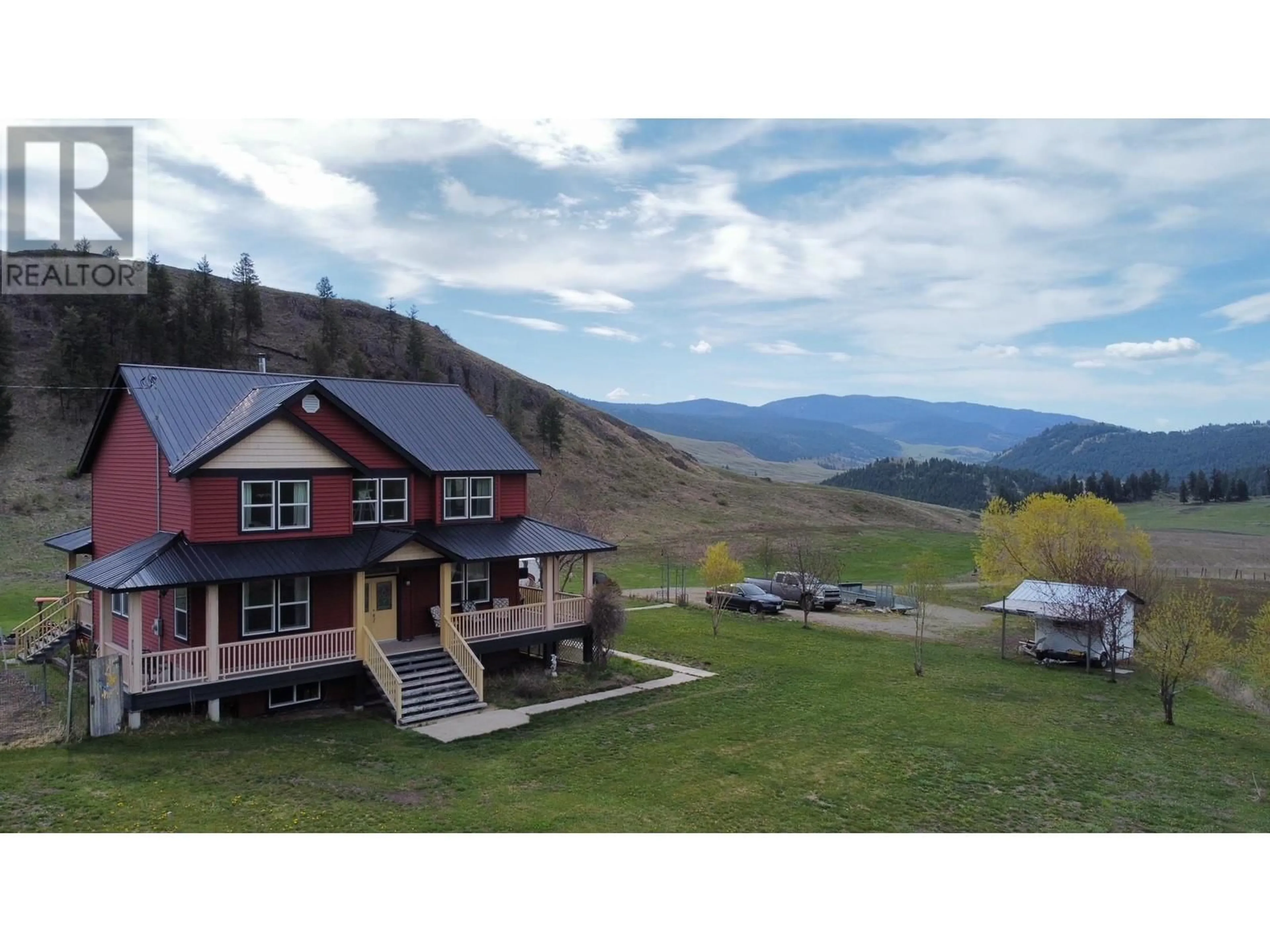 A pic from outside/outdoor area/front of a property/back of a property/a pic from drone, mountain view for 1670 HULME CREEK ROAD, Rock Creek British Columbia V0H1Y0