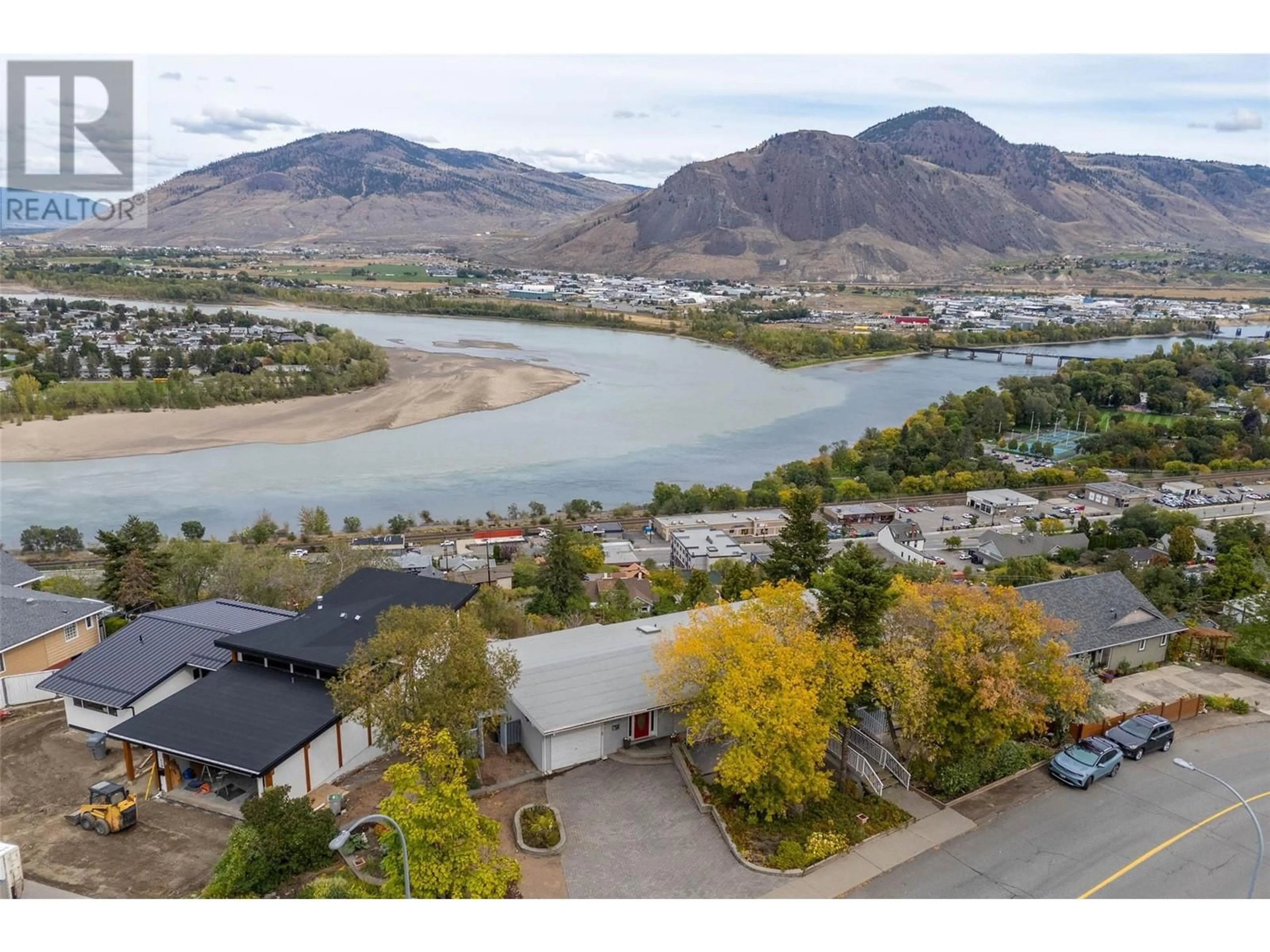 A pic from outside/outdoor area/front of a property/back of a property/a pic from drone, water/lake/river/ocean view for 402 STRATHCONA TERRACE, Kamloops British Columbia V2C1B9