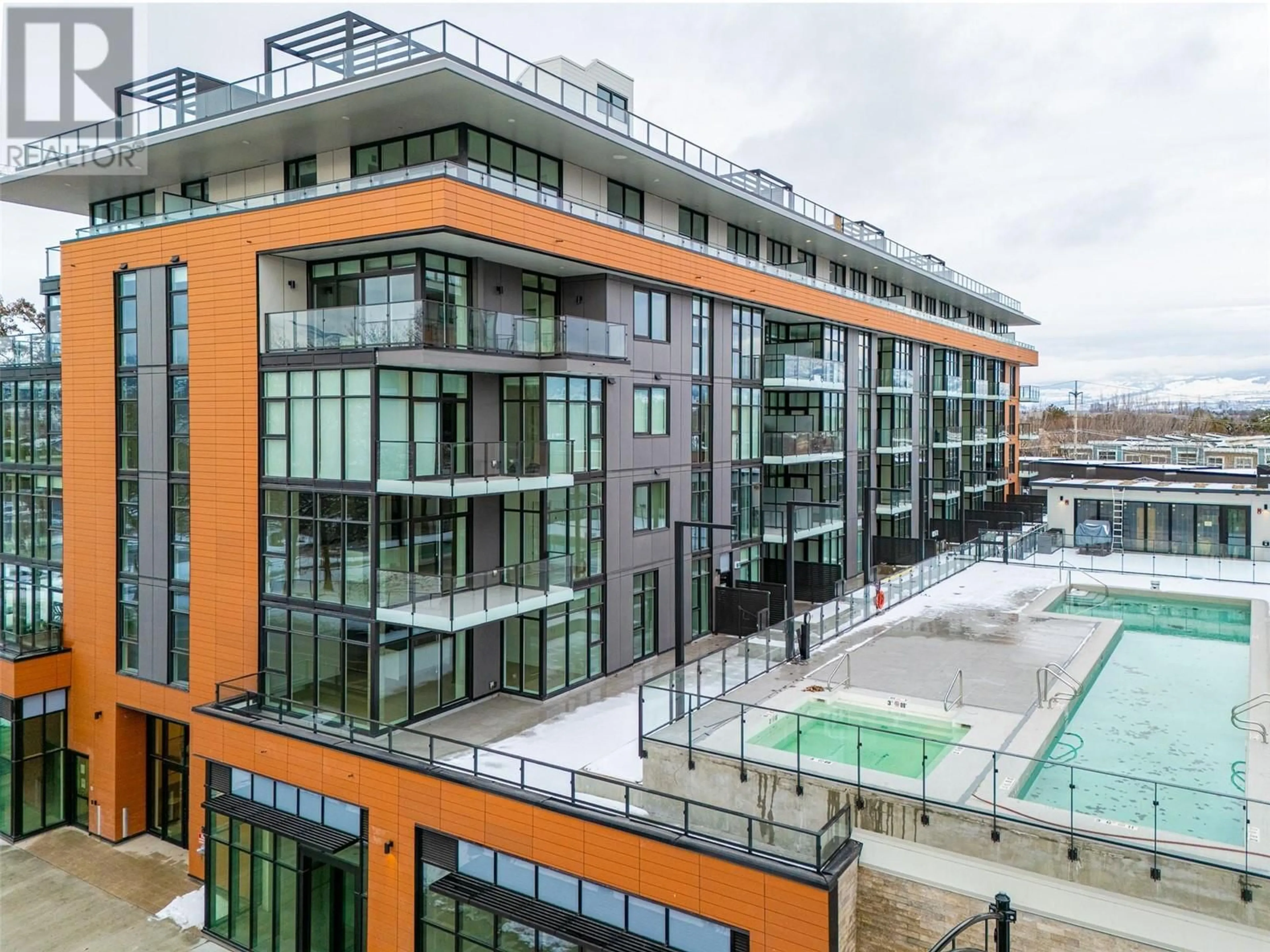 A pic from outside/outdoor area/front of a property/back of a property/a pic from drone, city buildings view from balcony for 312 - 3389 LAKESHORE ROAD, Kelowna British Columbia V1W0G5