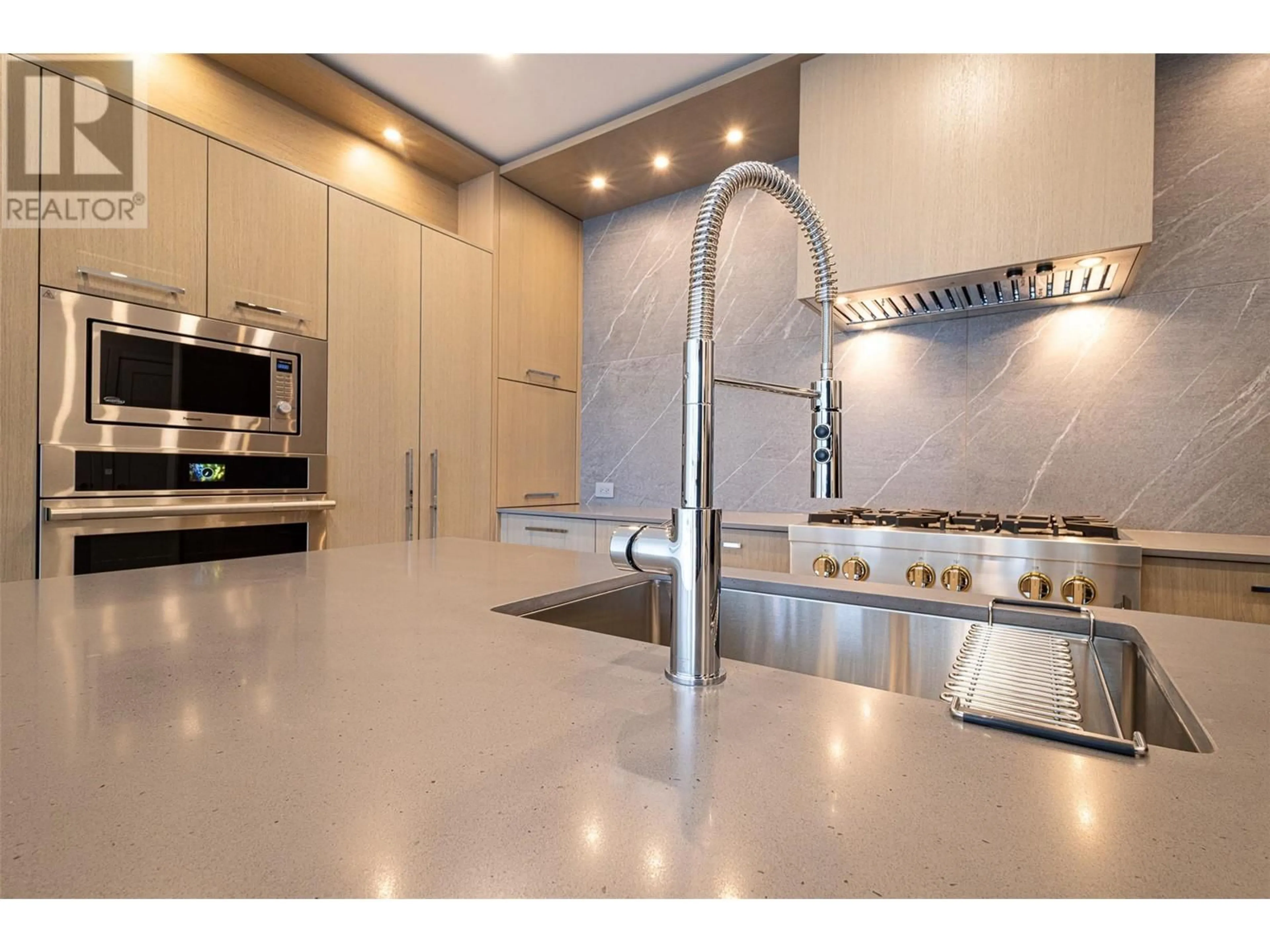 Contemporary kitchen, ceramic/tile floor for 312 - 3389 LAKESHORE ROAD, Kelowna British Columbia V1W0G5