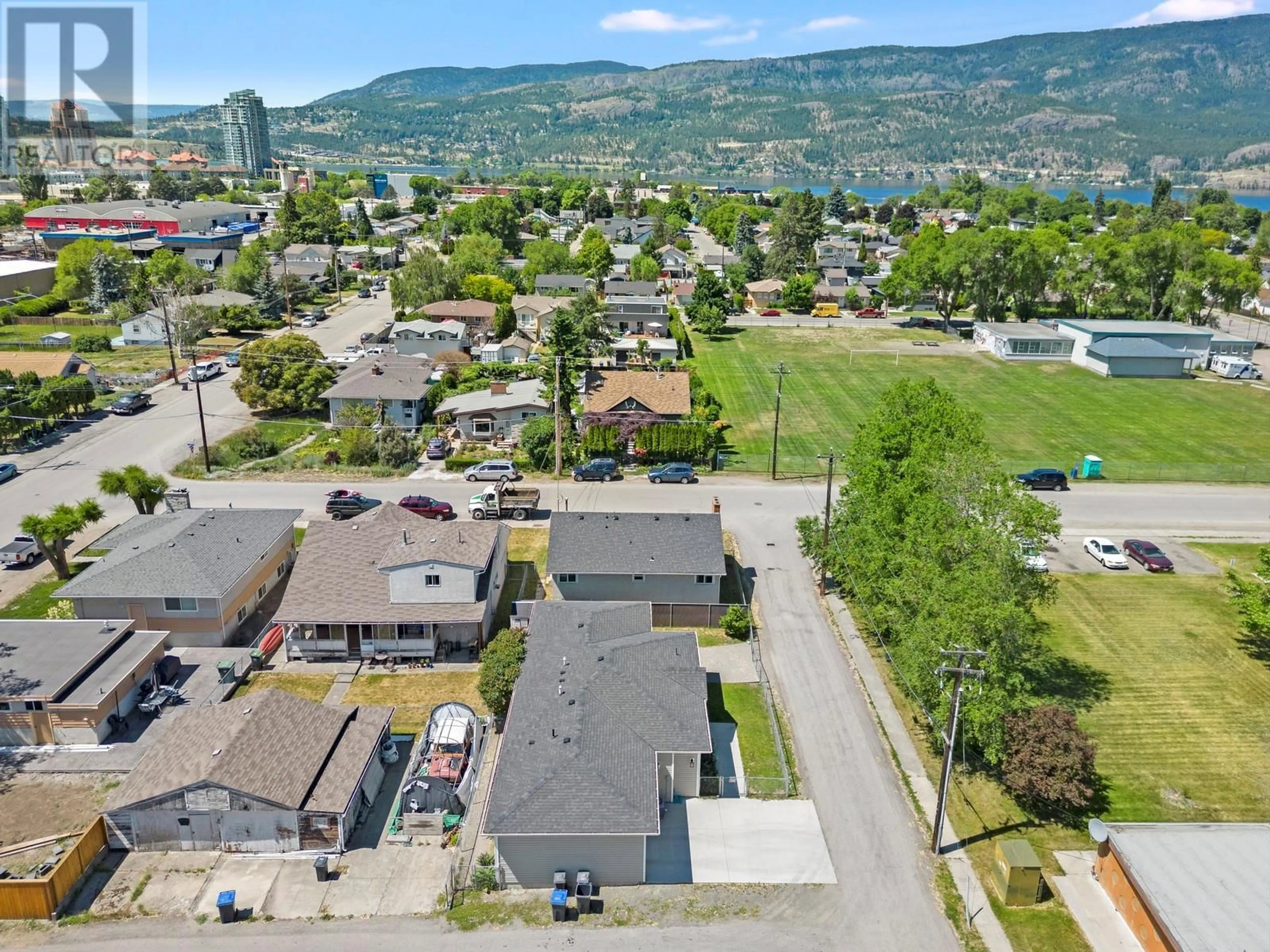 A pic from outside/outdoor area/front of a property/back of a property/a pic from drone, mountain view for 875-877 JONES STREET, Kelowna British Columbia V1Y2S6