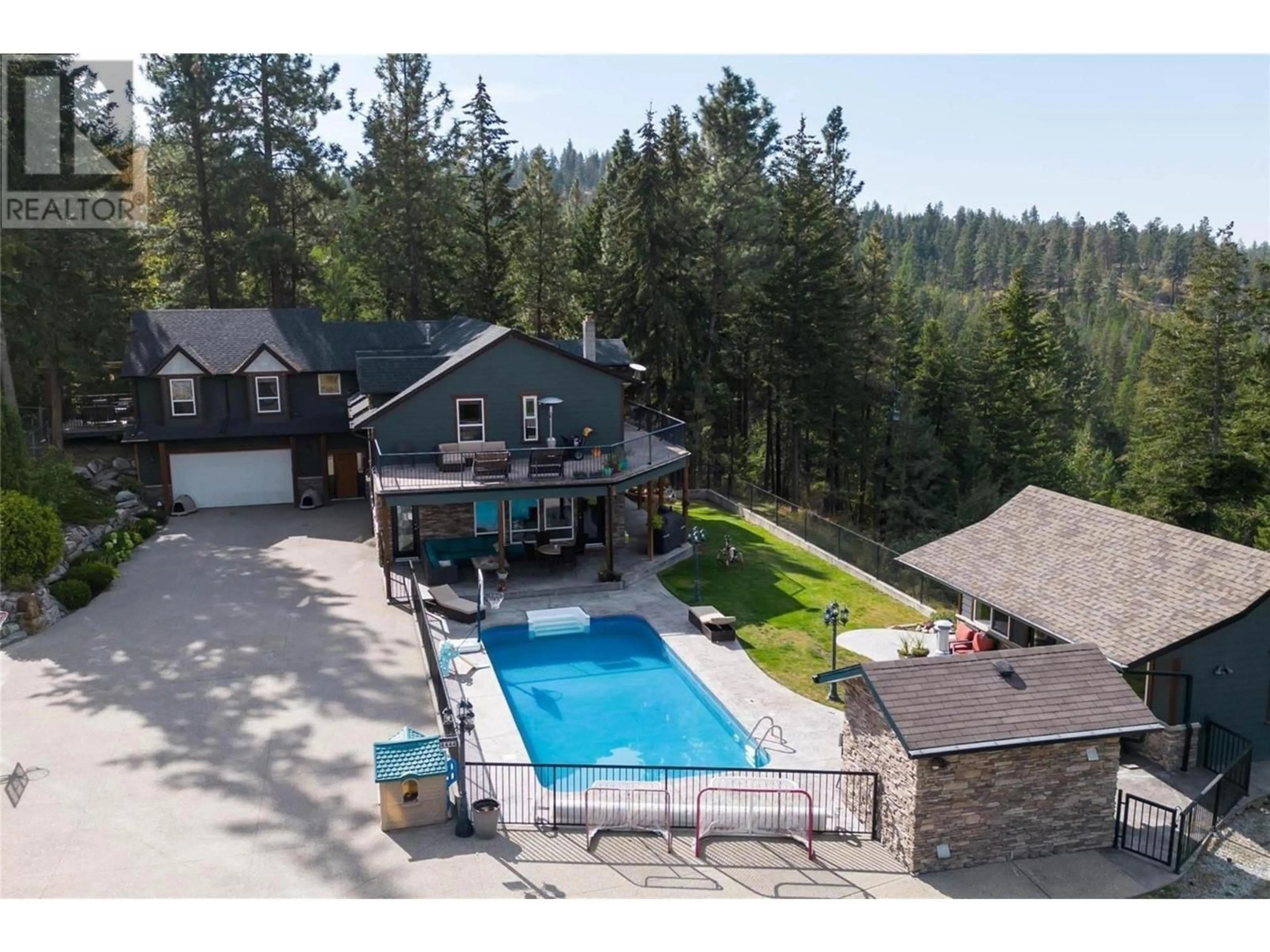 A pic from outside/outdoor area/front of a property/back of a property/a pic from drone, unknown for 4444 JUNE SPRINGS ROAD, Kelowna British Columbia V1W4C8