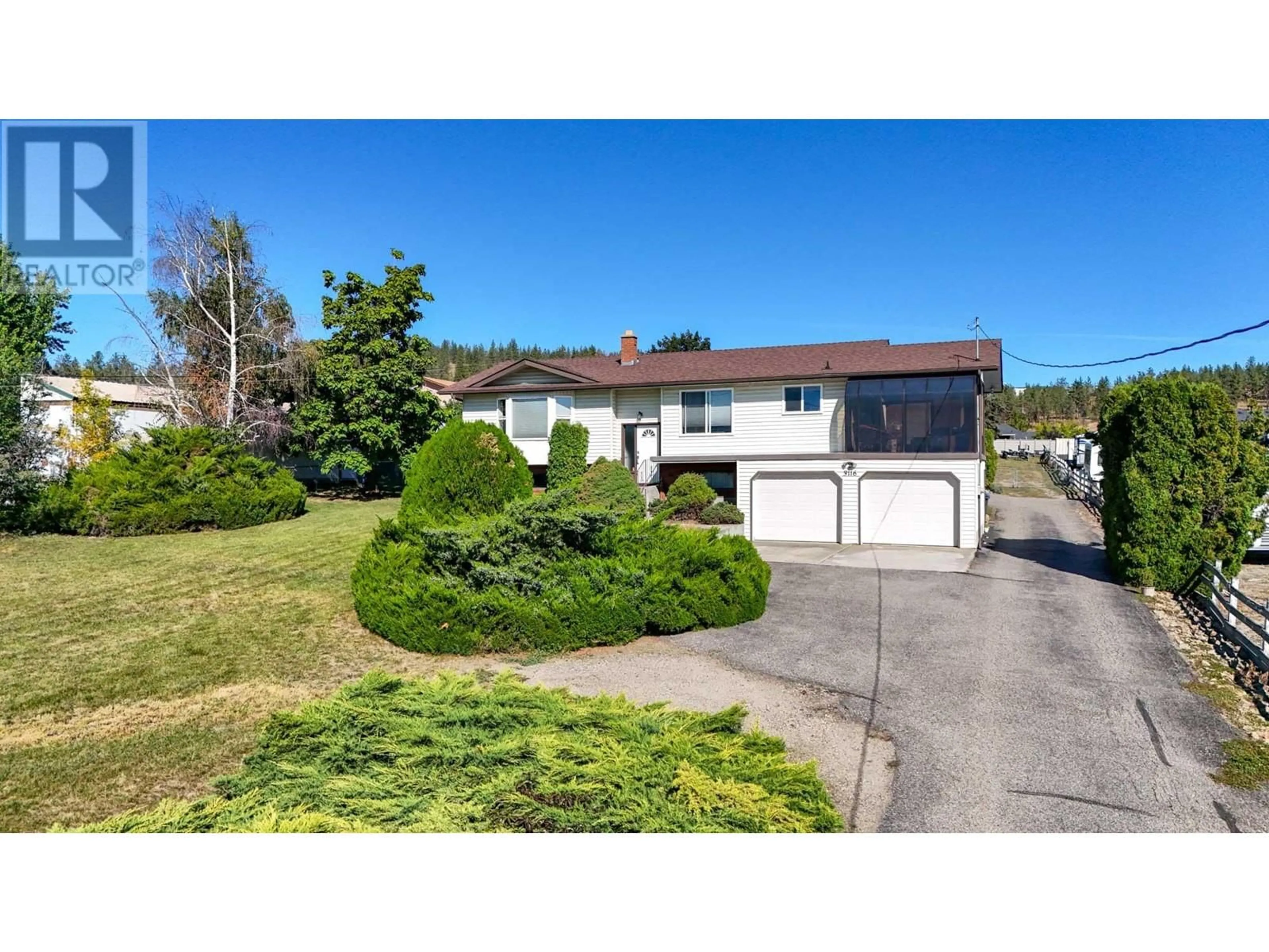 A pic from outside/outdoor area/front of a property/back of a property/a pic from drone, street for 3116 APPALOOSA ROAD, Kelowna British Columbia V1V2G9