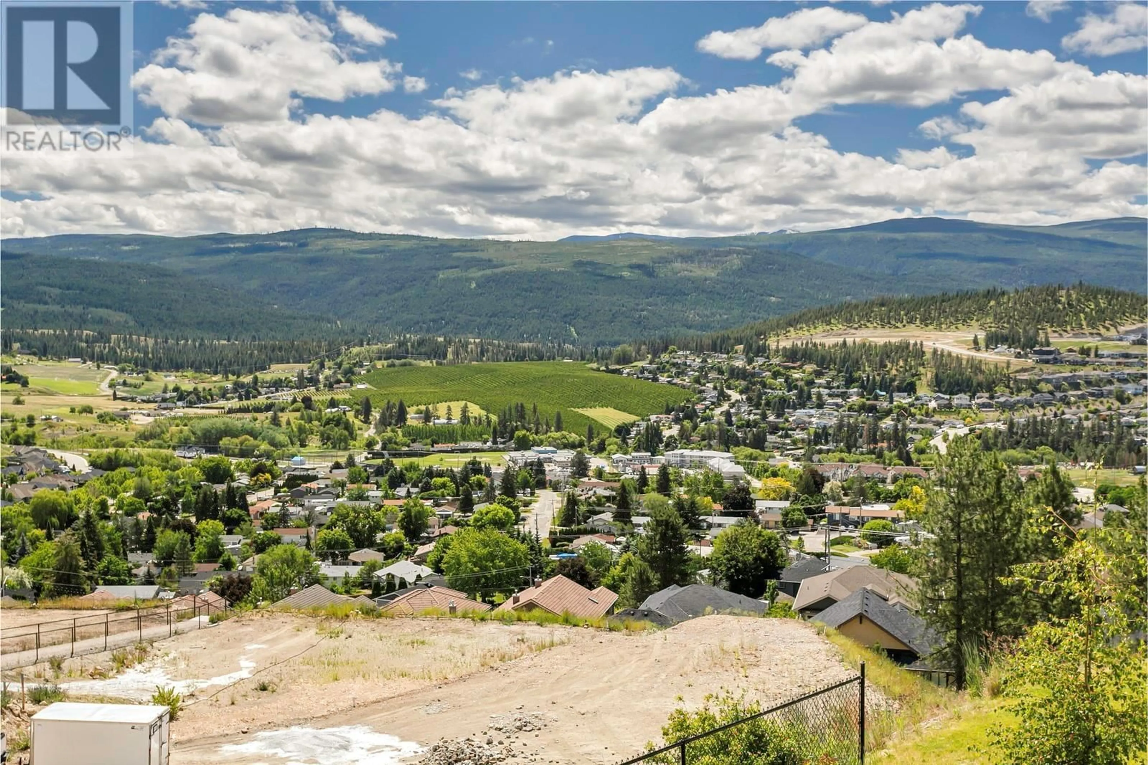 A pic from outside/outdoor area/front of a property/back of a property/a pic from drone, mountain view for 1077 LOSETH DRIVE, Kelowna British Columbia V1P0A1