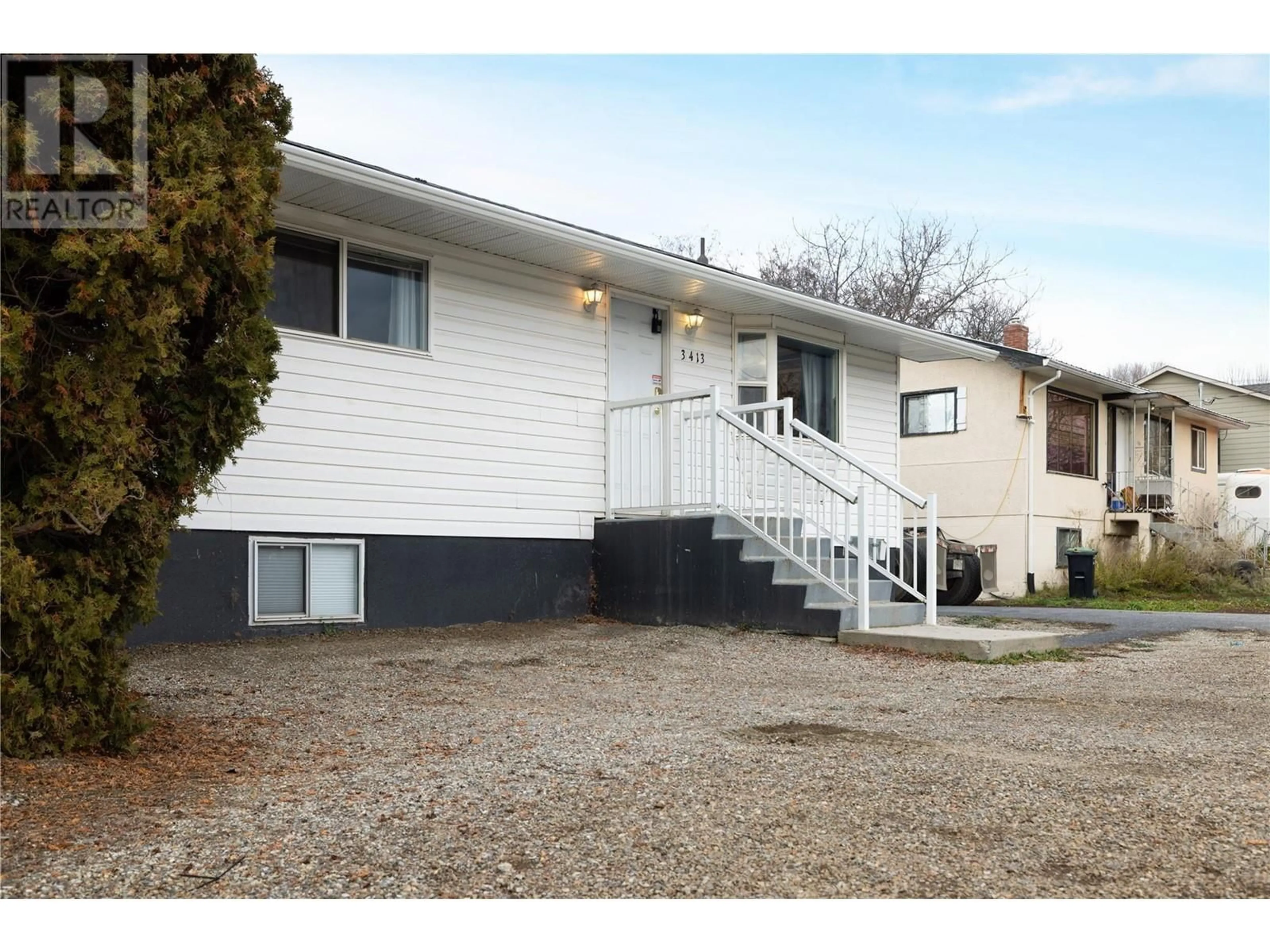 Home with vinyl exterior material, street for 3413 24 AVENUE, Vernon British Columbia V1T1L7