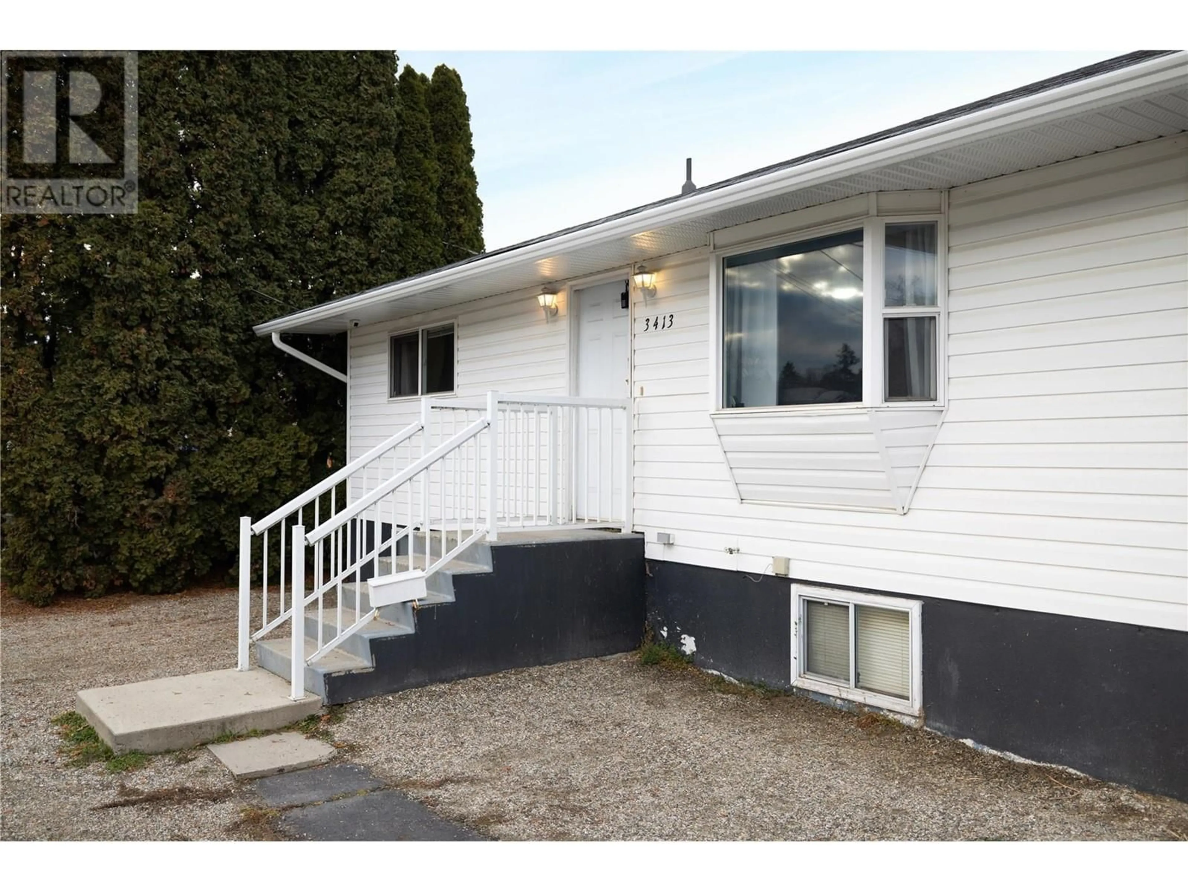 Home with vinyl exterior material, street for 3413 24 AVENUE, Vernon British Columbia V1T1L7