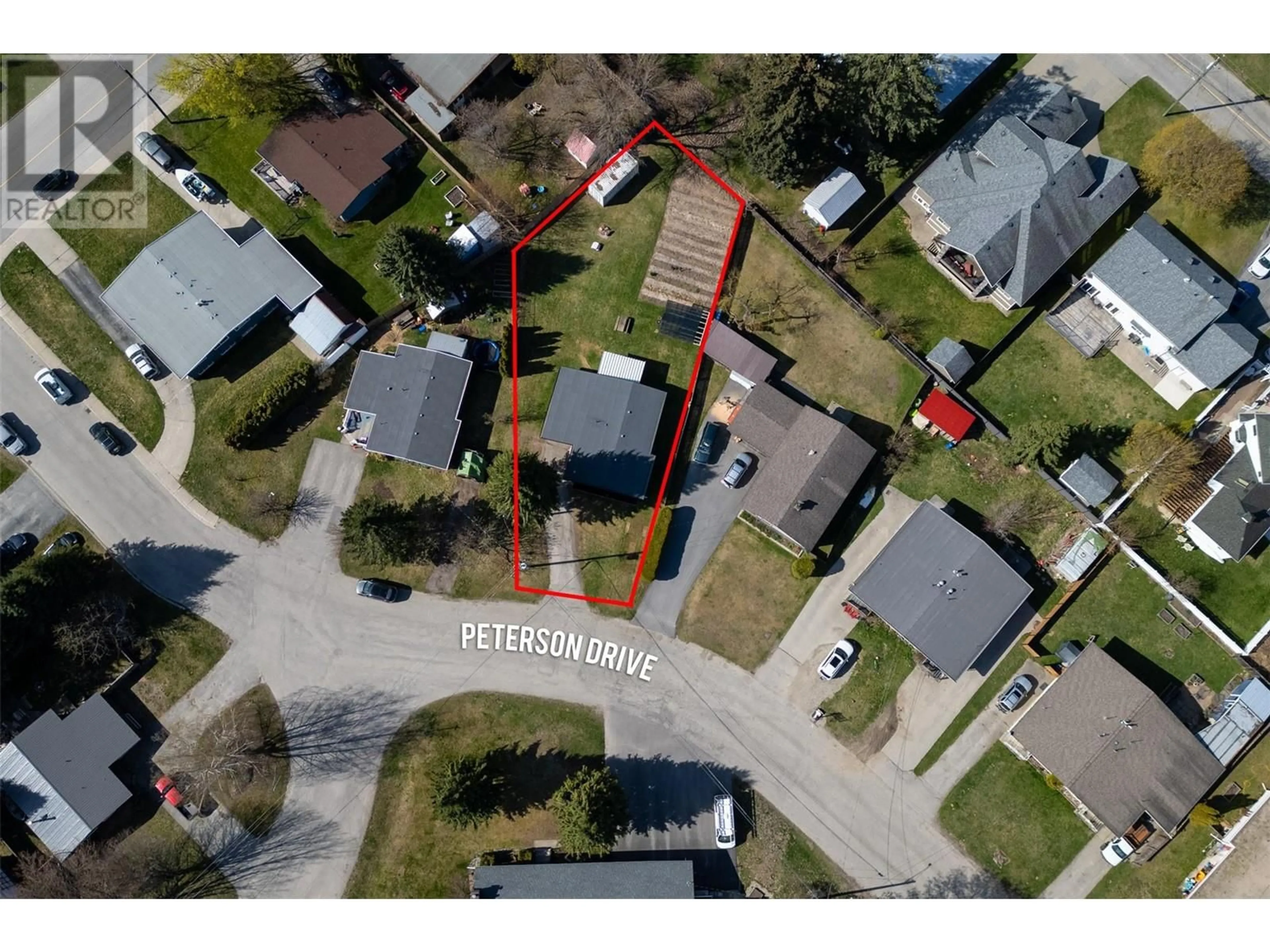 A pic from outside/outdoor area/front of a property/back of a property/a pic from drone, street for 117 PETERSON DRIVE, Revelstoke British Columbia V0E2S0