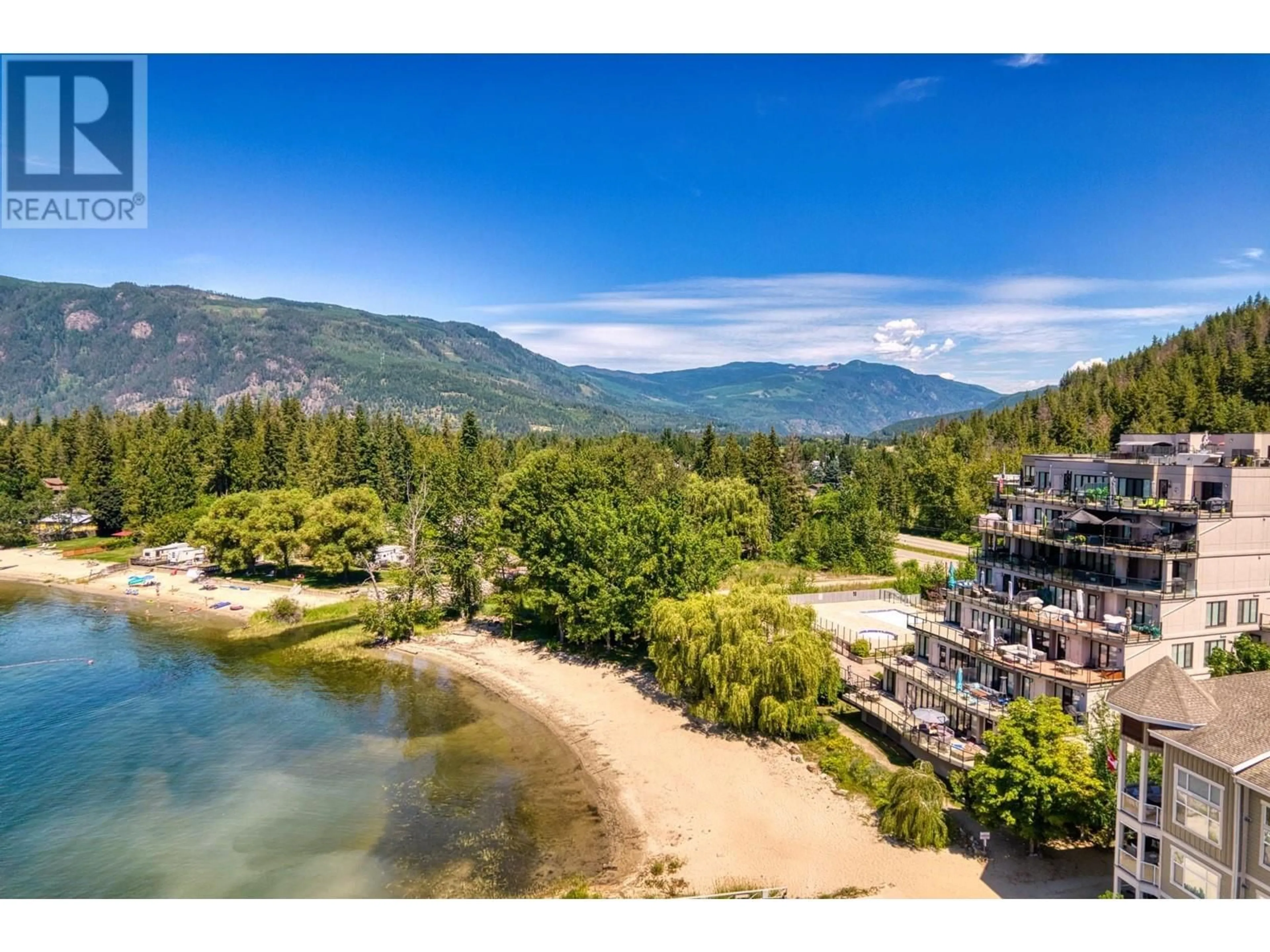 A pic from outside/outdoor area/front of a property/back of a property/a pic from drone, water/lake/river/ocean view for 509 - 326 MARA LAKE LANE, Sicamous British Columbia V0E2V1