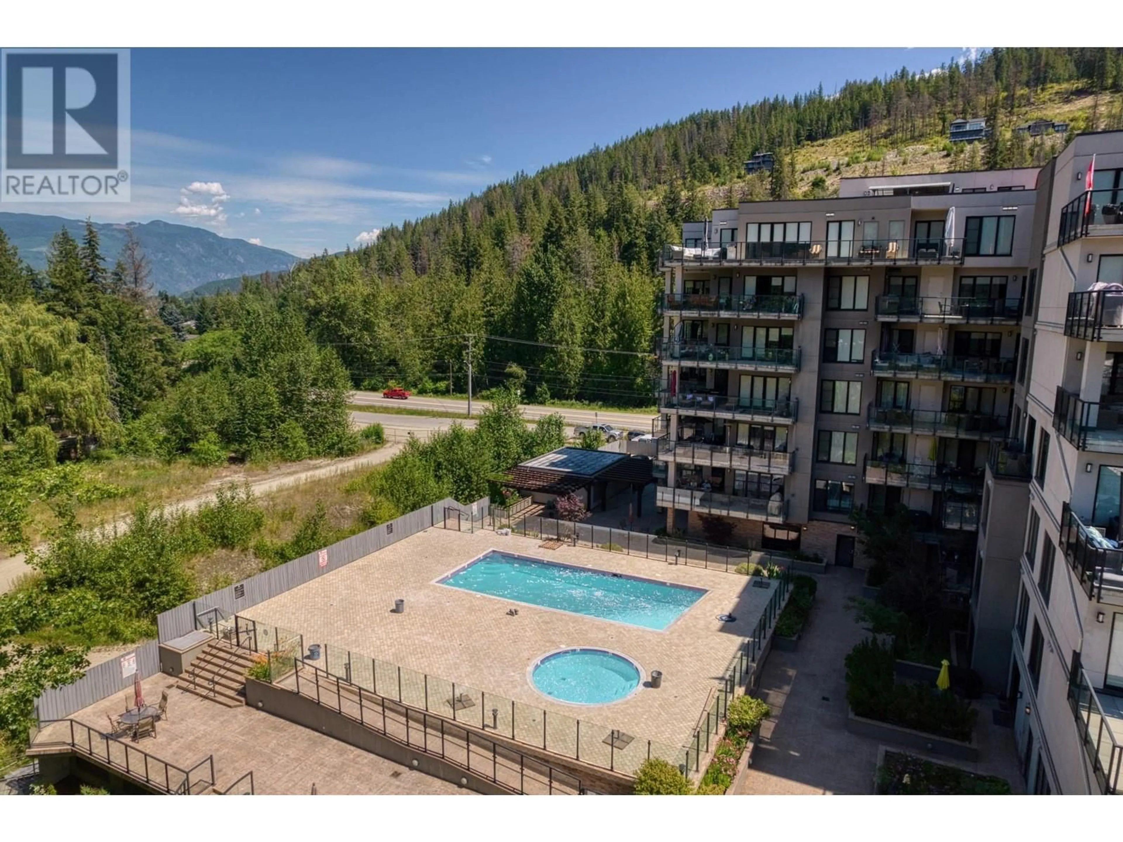 A pic from outside/outdoor area/front of a property/back of a property/a pic from drone, mountain view for 509 - 326 MARA LAKE LANE, Sicamous British Columbia V0E2V1