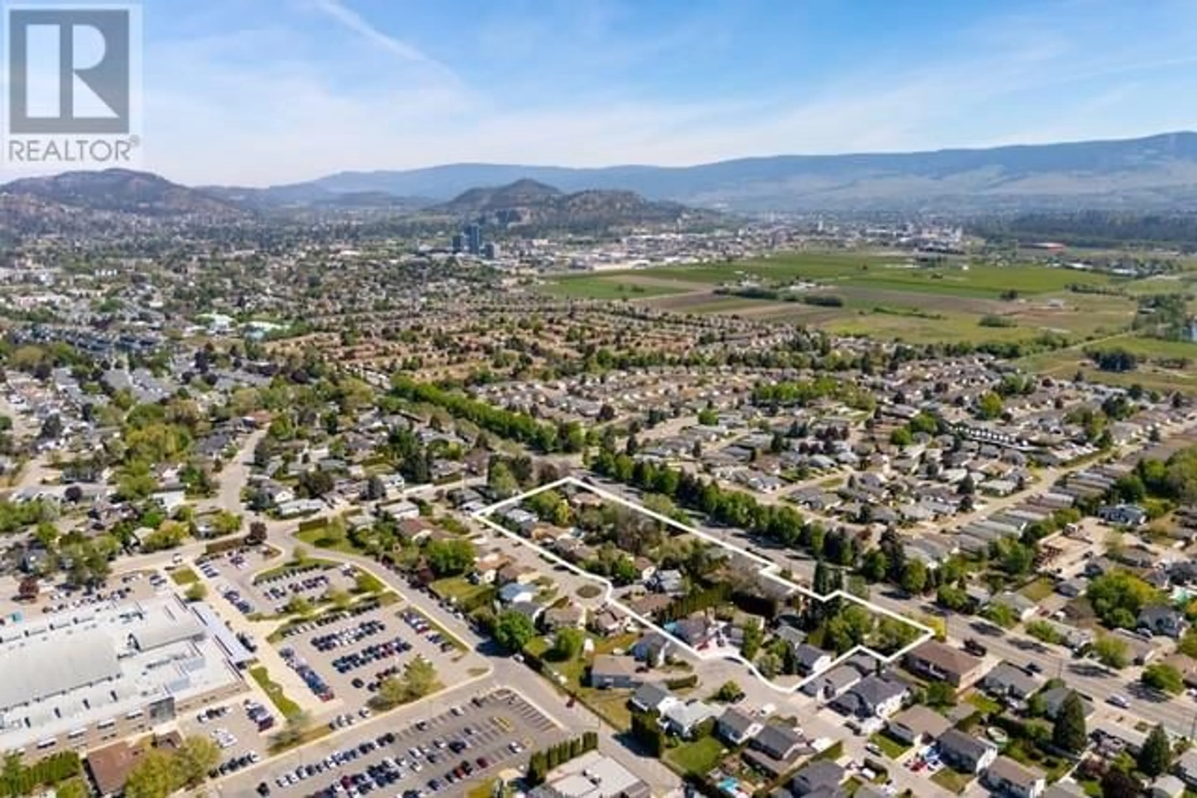 A pic from outside/outdoor area/front of a property/back of a property/a pic from drone, mountain view for 2913 BOUVETTE STREET, Kelowna British Columbia V1Y3K5