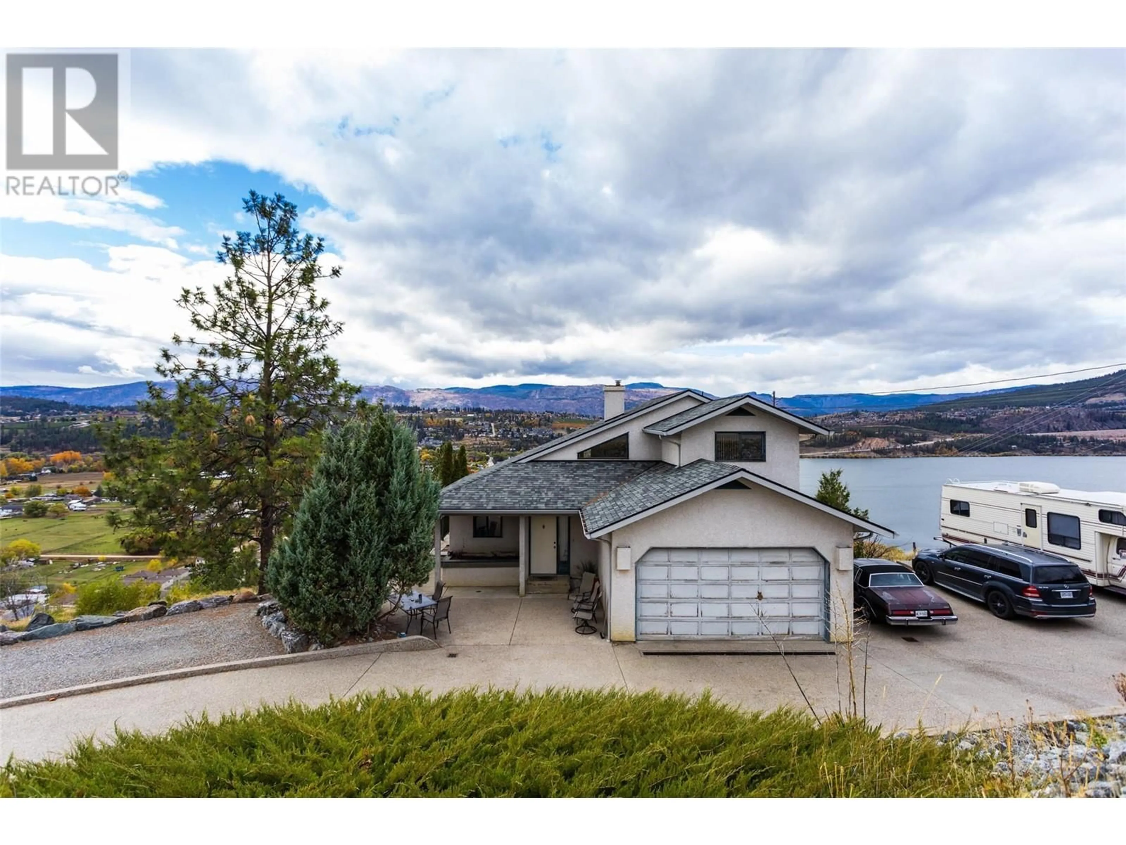 A pic from outside/outdoor area/front of a property/back of a property/a pic from drone, water/lake/river/ocean view for 11482 DARLENE ROAD, Lake Country British Columbia V4V1Y4