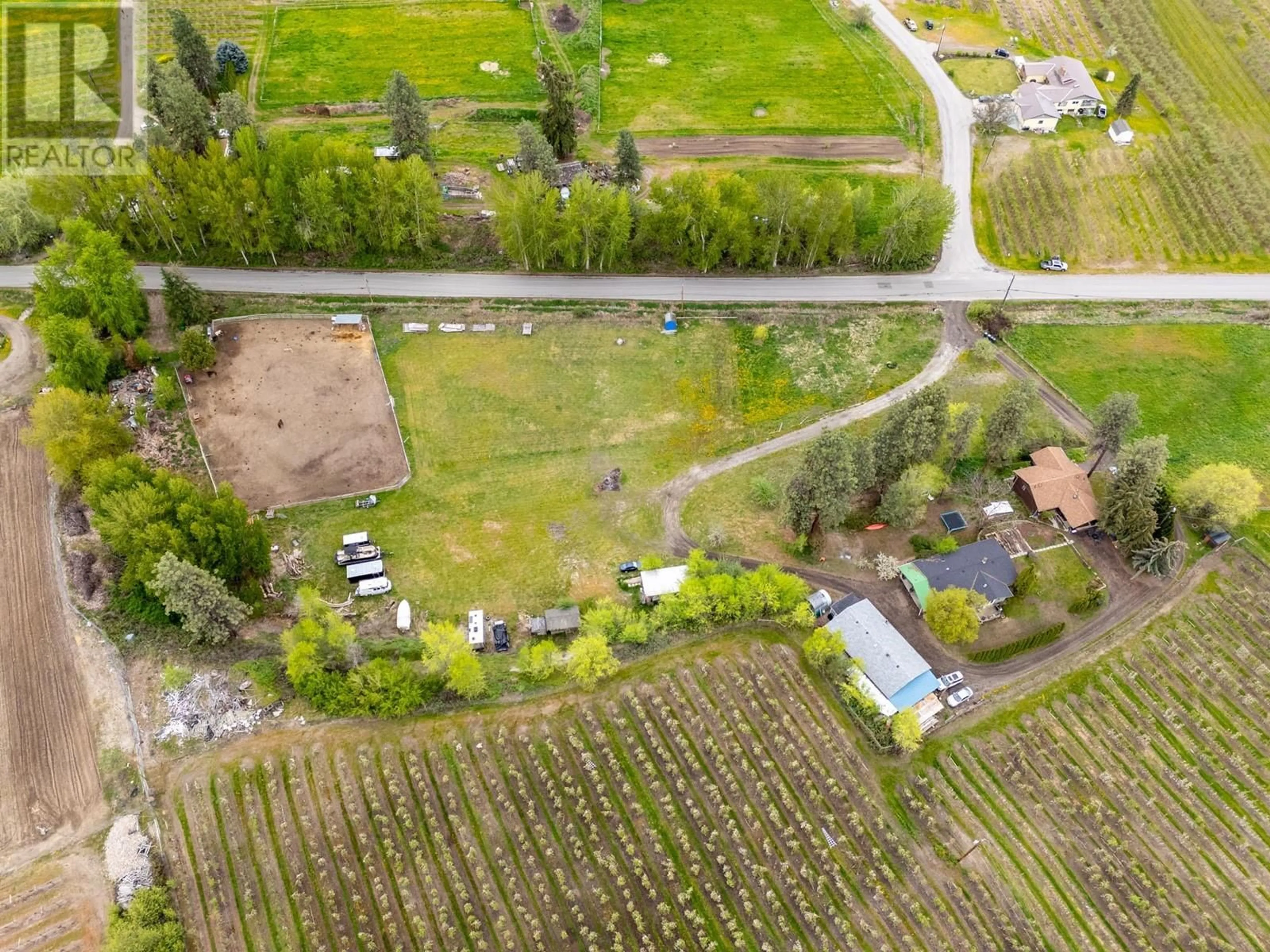 A pic from outside/outdoor area/front of a property/back of a property/a pic from drone, street for 3060 GULLEY ROAD, Kelowna British Columbia V1W4E5
