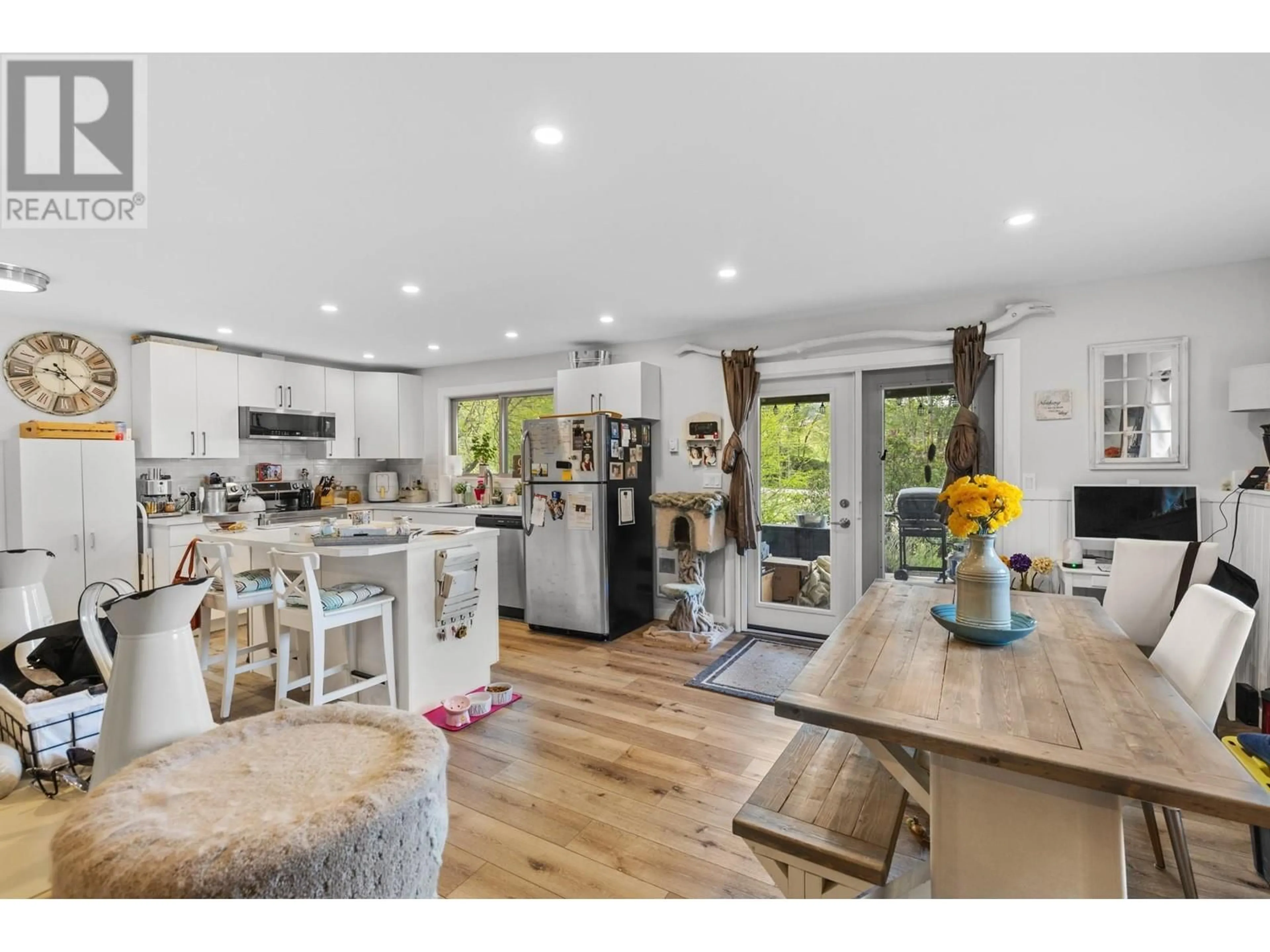 Open concept kitchen, wood/laminate floor for 3060 GULLEY ROAD, Kelowna British Columbia V1W4E5