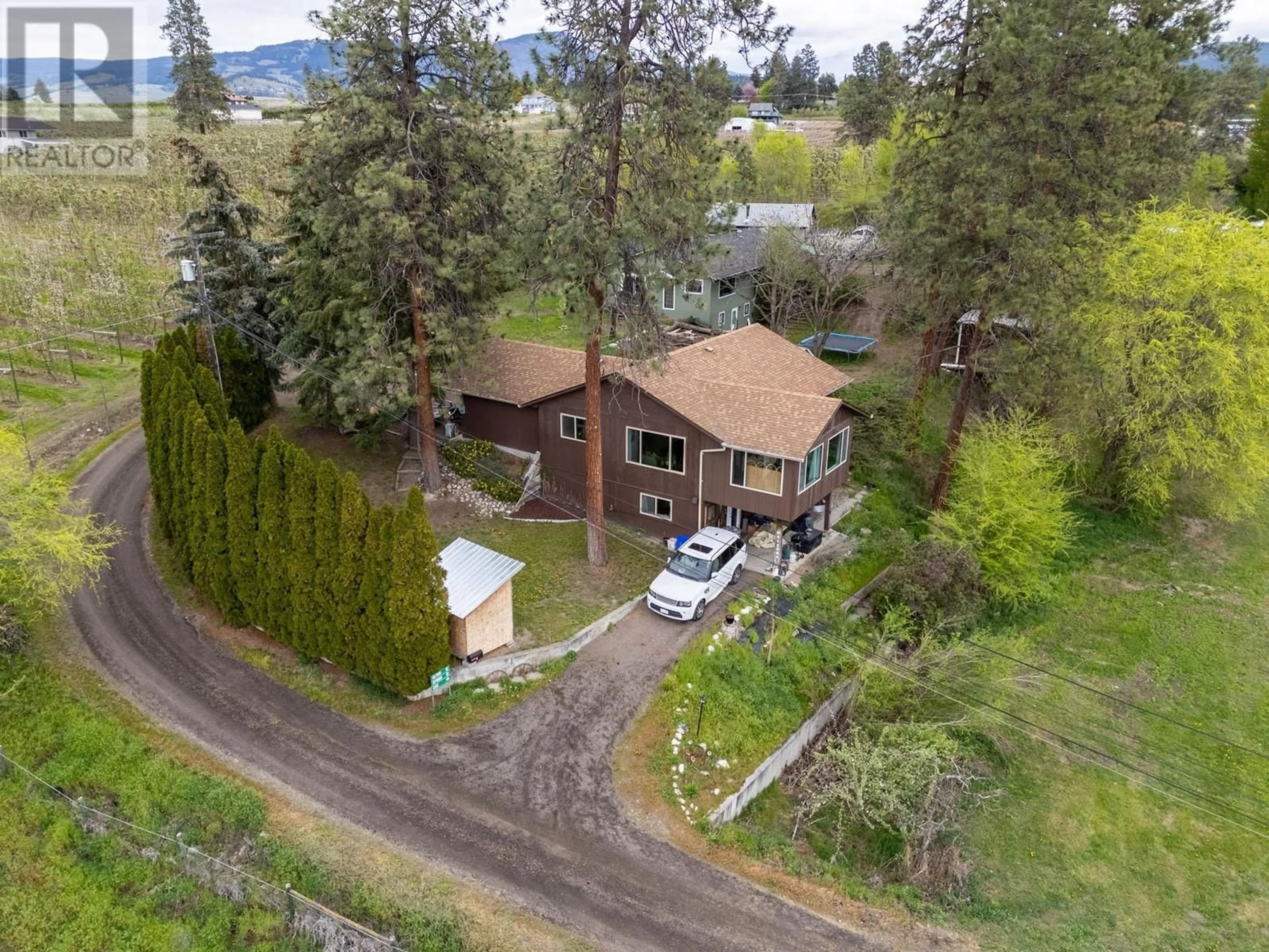 A pic from outside/outdoor area/front of a property/back of a property/a pic from drone, water/lake/river/ocean view for 3060 GULLEY ROAD, Kelowna British Columbia V1W4E5