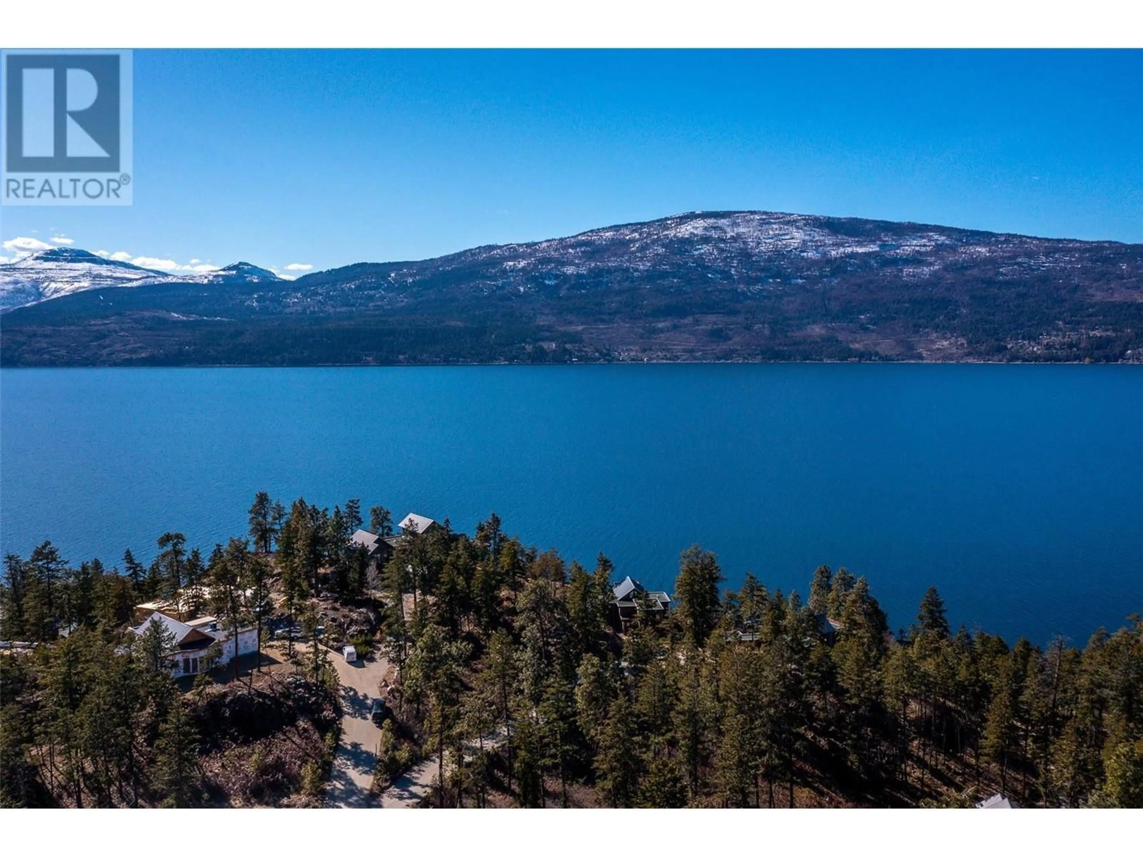 A pic from outside/outdoor area/front of a property/back of a property/a pic from drone, water/lake/river/ocean view for 159 - 9845 EASTSIDE ROAD, Vernon British Columbia V1H1Z2