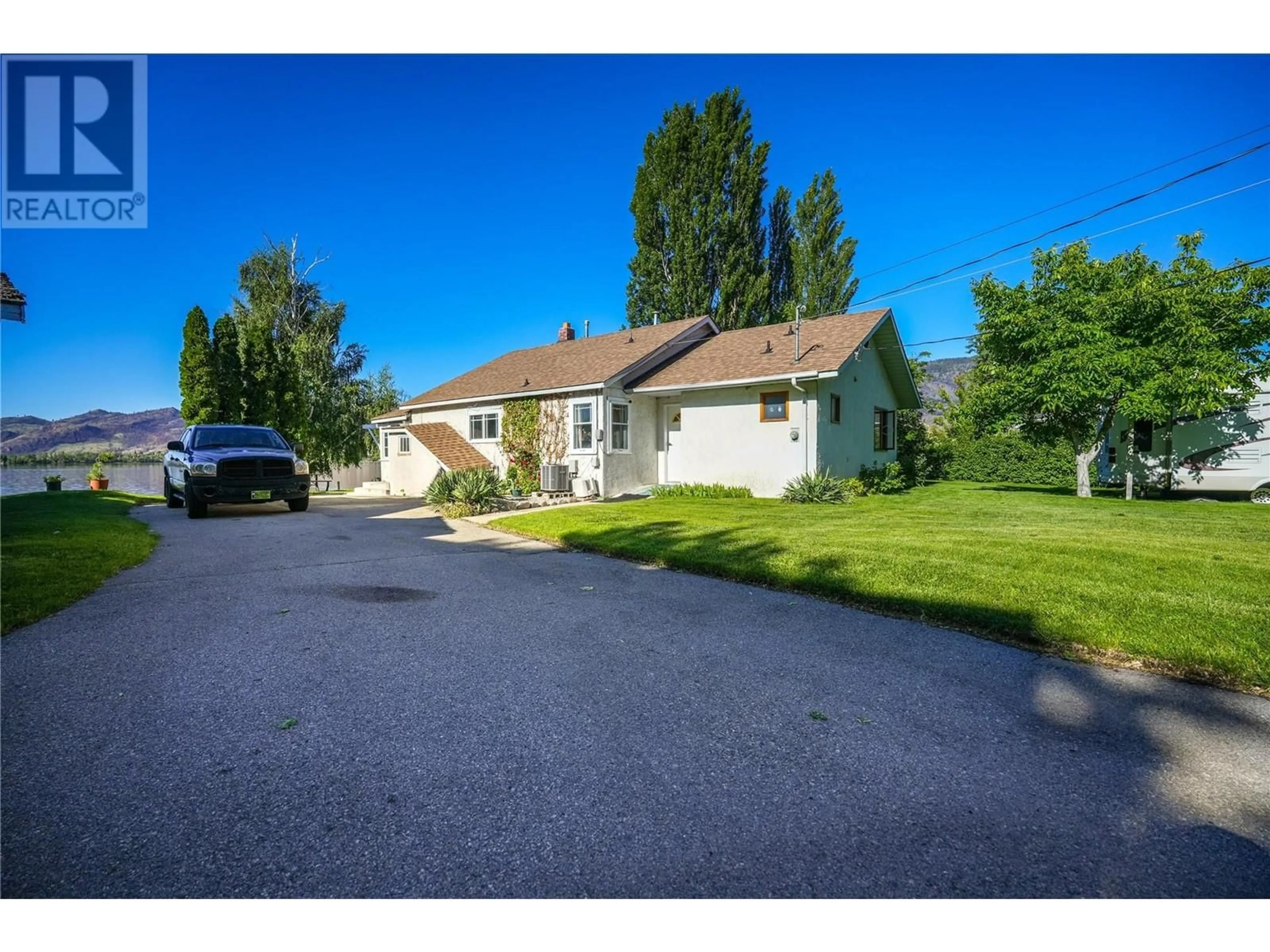A pic from outside/outdoor area/front of a property/back of a property/a pic from drone, street for 9 HARBOUR KEY DRIVE, Osoyoos British Columbia V0H1V3