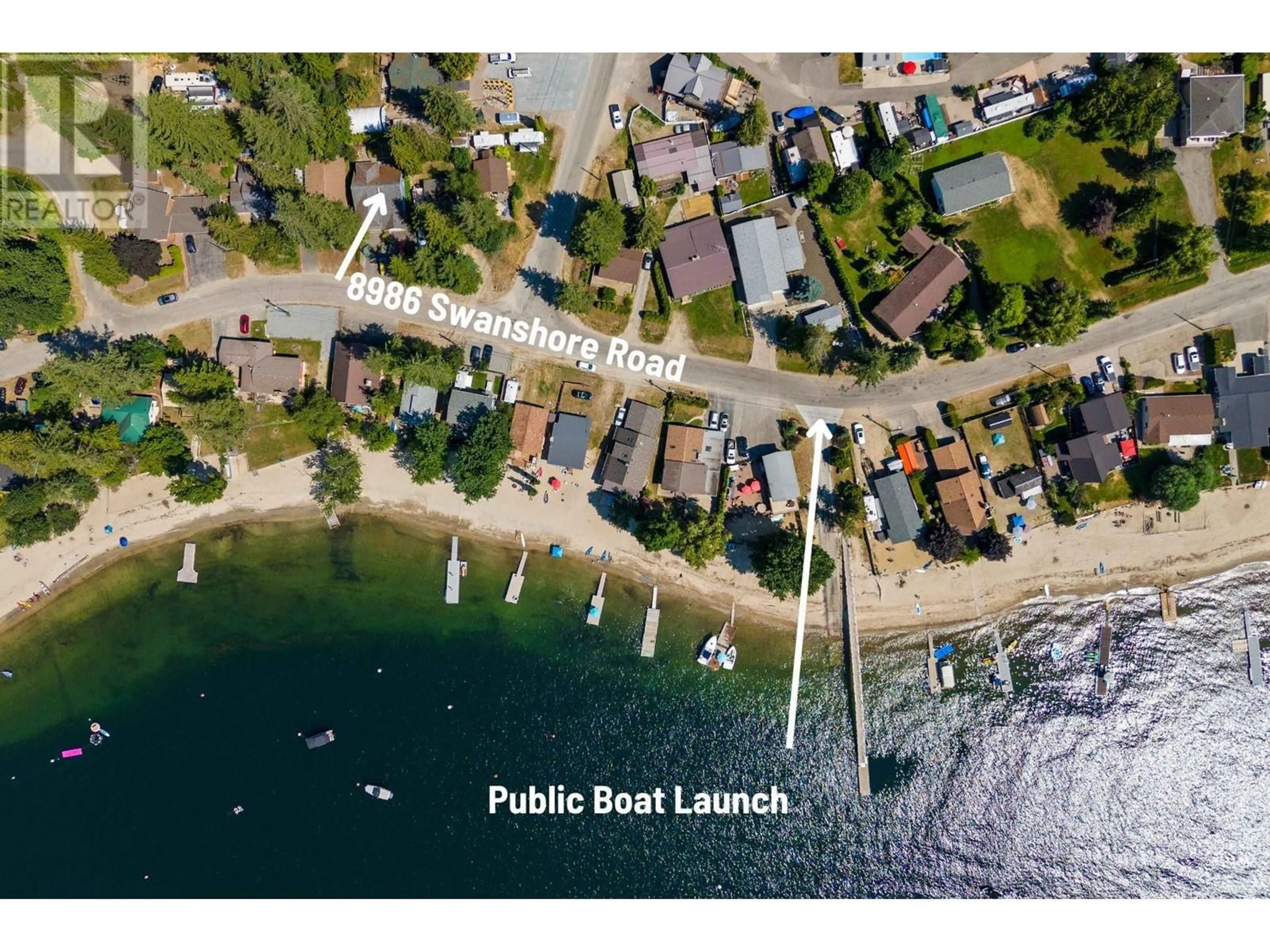 A pic from outside/outdoor area/front of a property/back of a property/a pic from drone, street for 8986 SWANSHORE ROAD, Swansea Point British Columbia V0E2K0