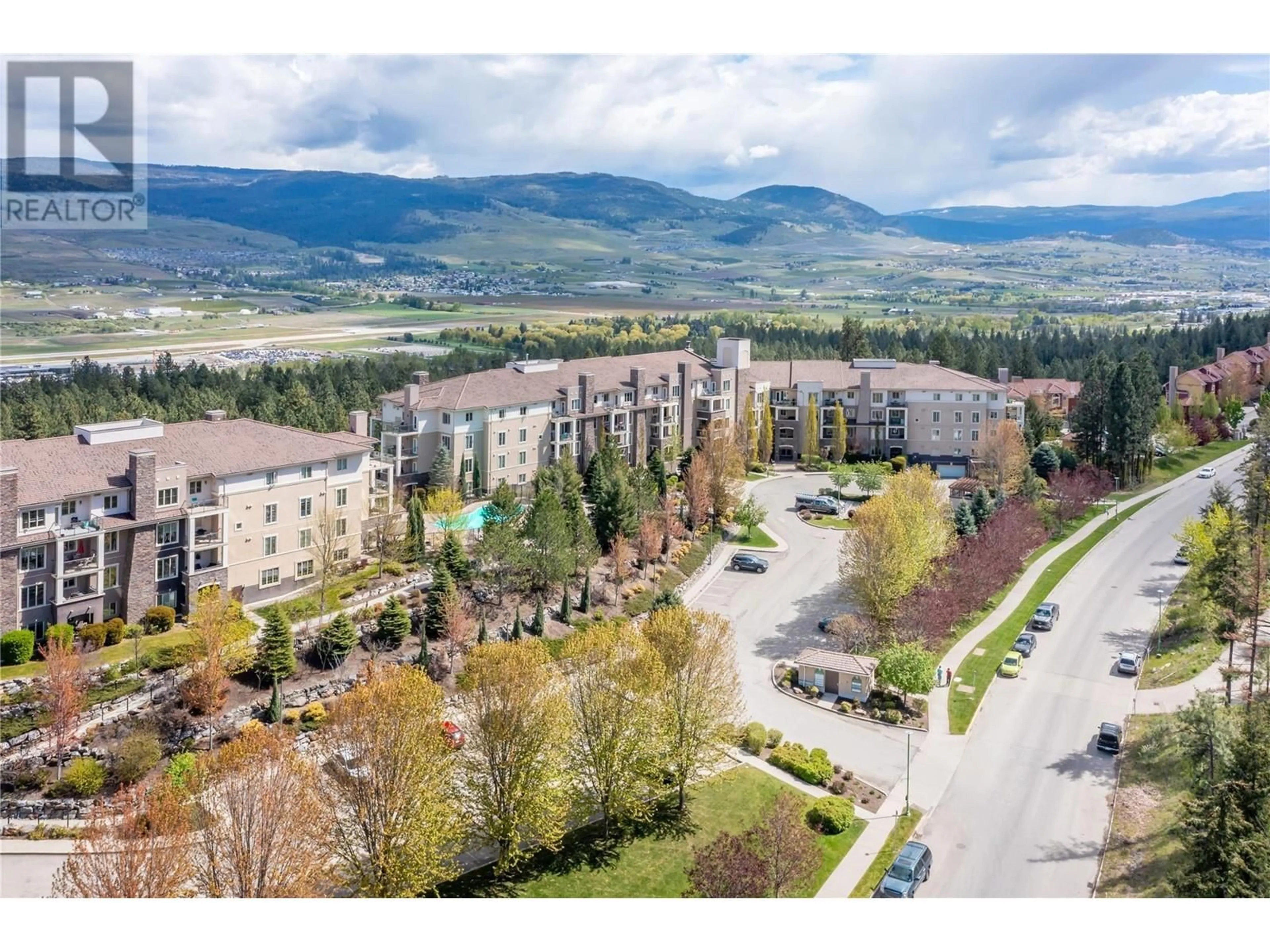 A pic from outside/outdoor area/front of a property/back of a property/a pic from drone, mountain view for 1305 - 1875 COUNTRY CLUB DRIVE, Kelowna British Columbia V1V2W7