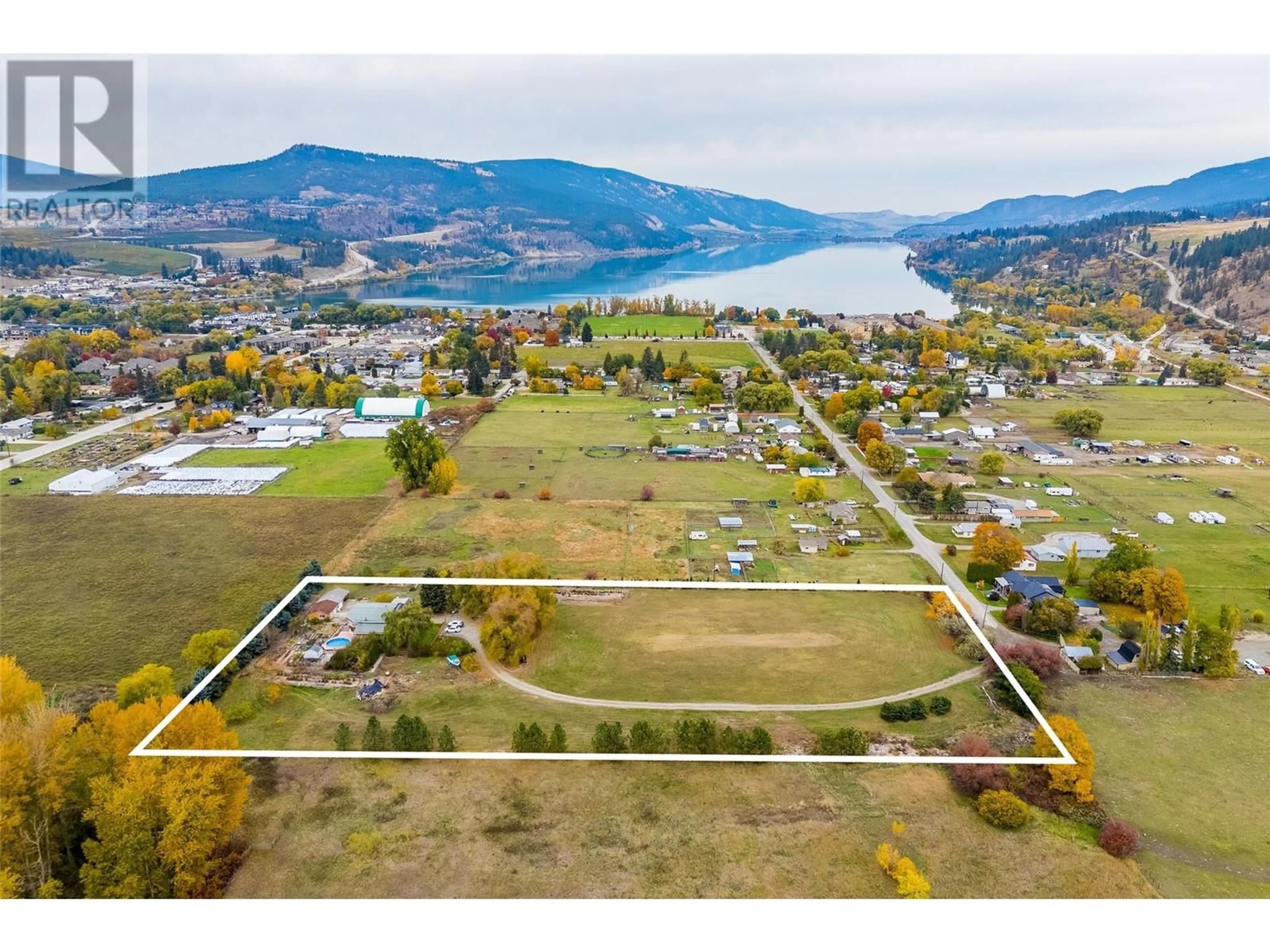 A pic from outside/outdoor area/front of a property/back of a property/a pic from drone, water/lake/river/ocean view for 11024 REISWIG ROAD, Lake Country British Columbia V4V1X3