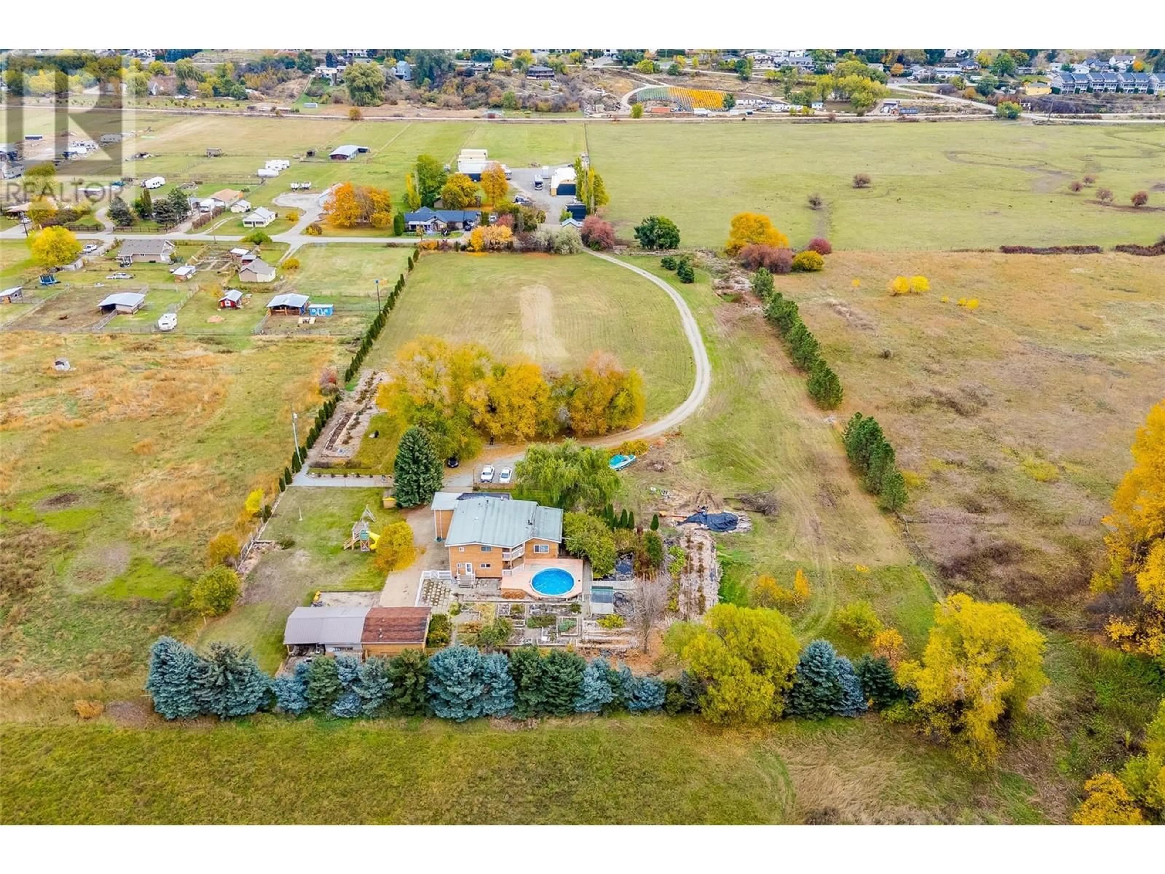 A pic from outside/outdoor area/front of a property/back of a property/a pic from drone, mountain view for 11024 REISWIG ROAD, Lake Country British Columbia V4V1X3