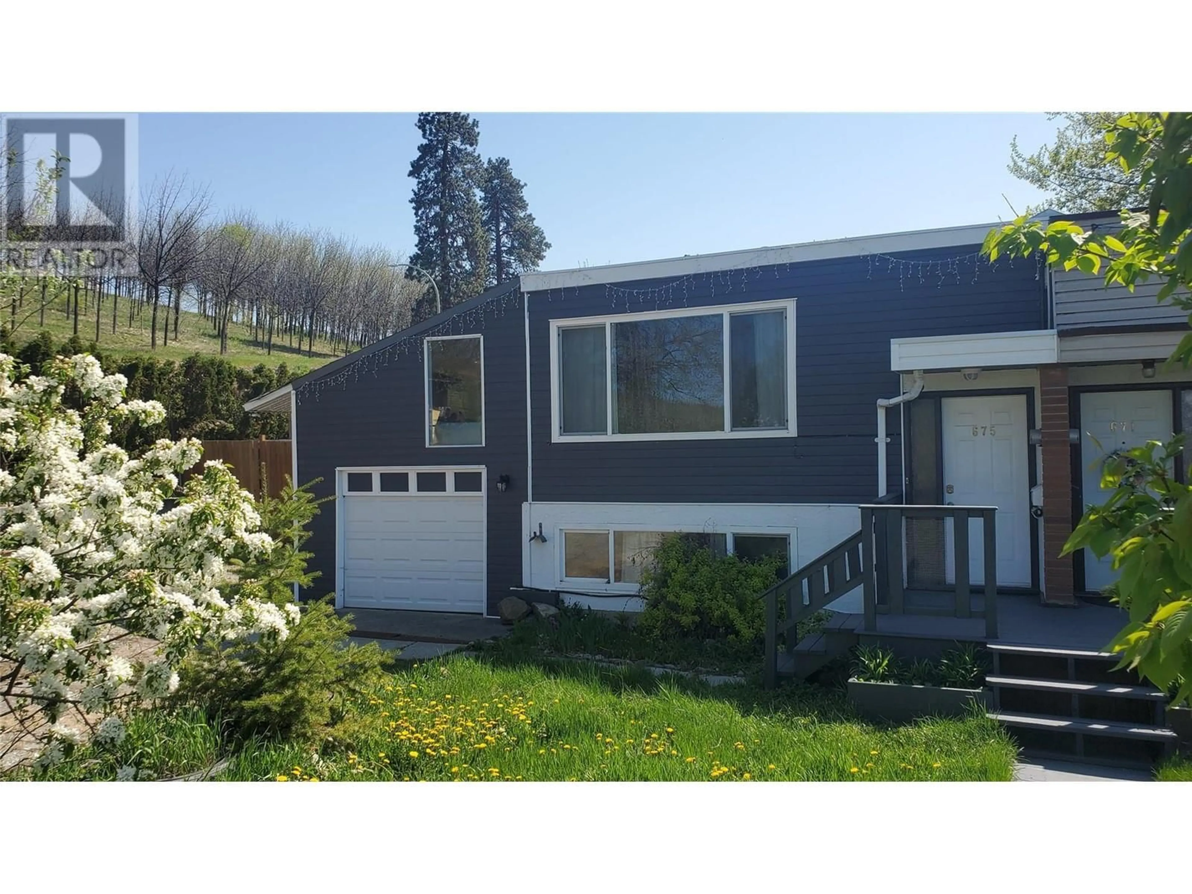 Home with vinyl exterior material, street for 675 WEBSTER ROAD, Kelowna British Columbia V1X4V6