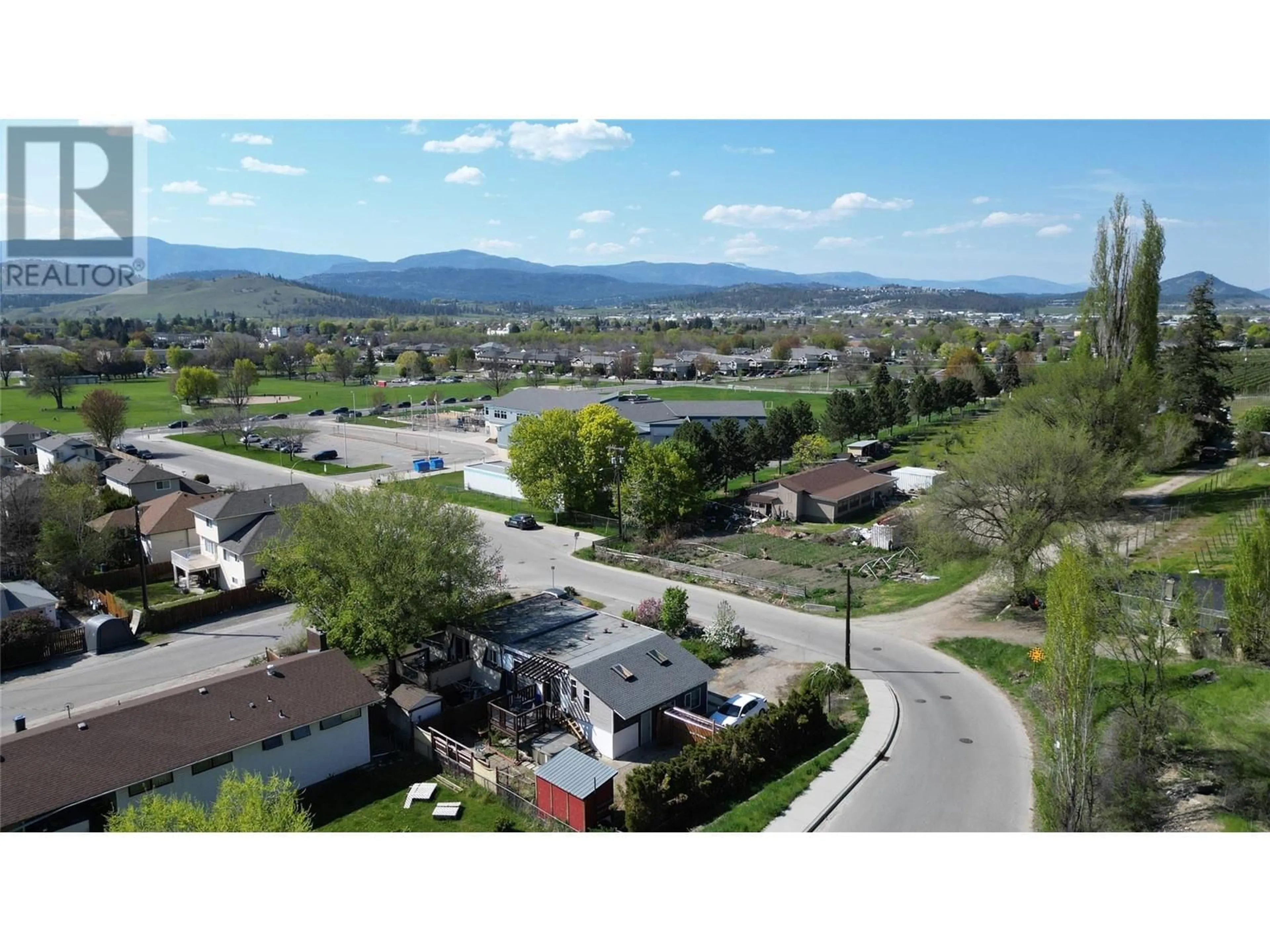 A pic from outside/outdoor area/front of a property/back of a property/a pic from drone, mountain view for 675 WEBSTER ROAD, Kelowna British Columbia V1X4V6
