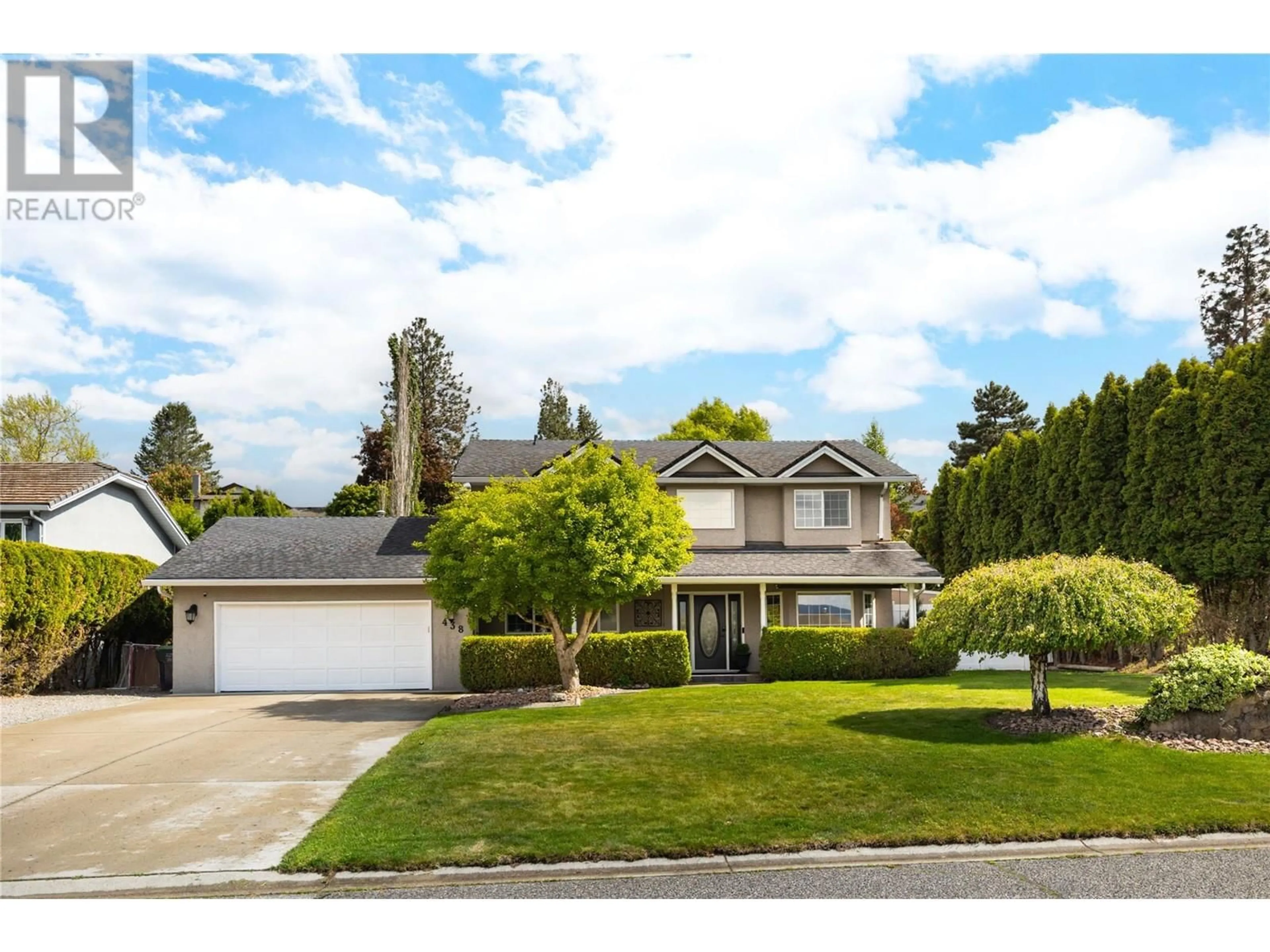 Home with vinyl exterior material, street for 438 CURLEW DRIVE, Kelowna British Columbia V1W4L2