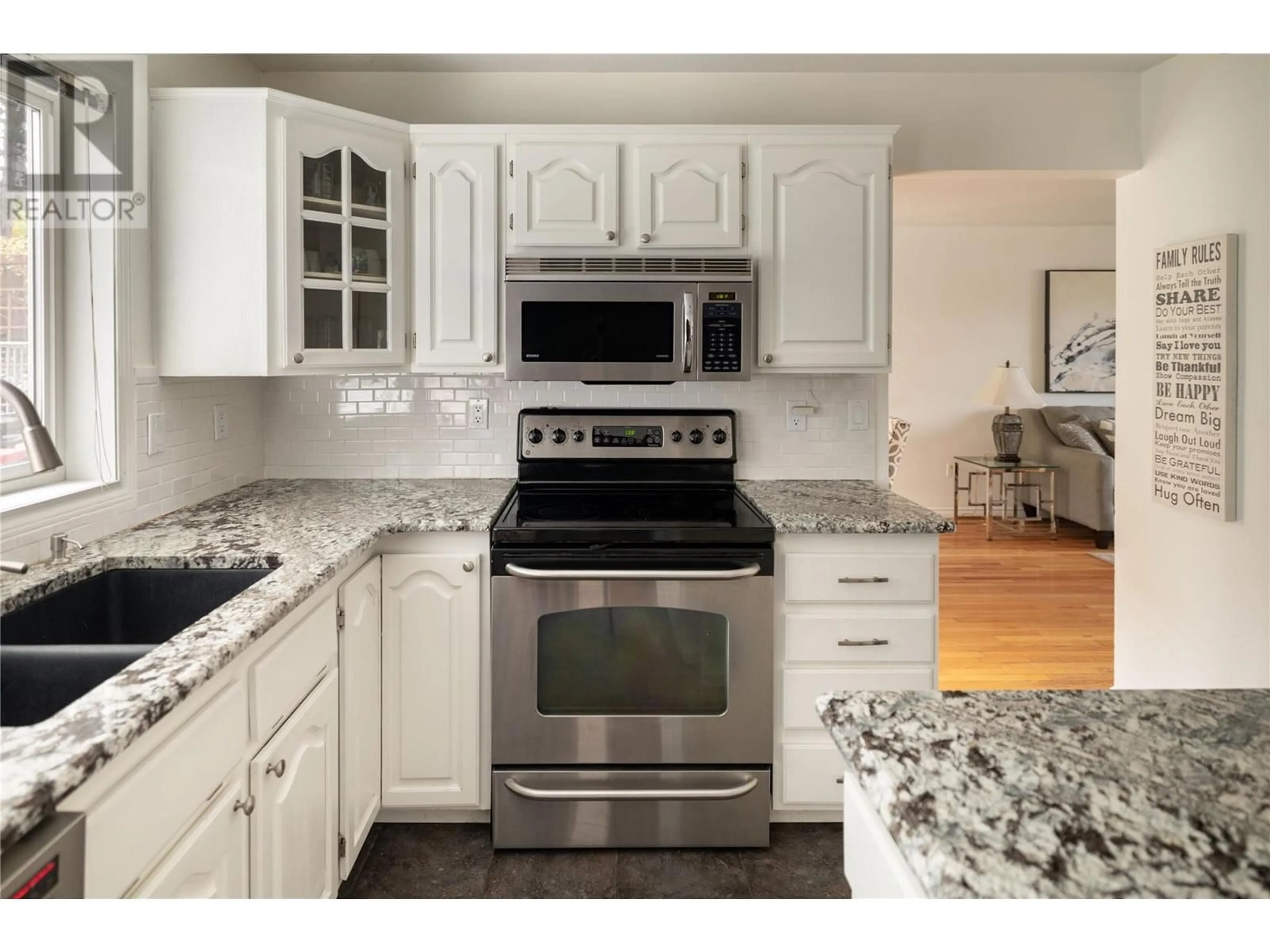Open concept kitchen, ceramic/tile floor for 438 CURLEW DRIVE, Kelowna British Columbia V1W4L2