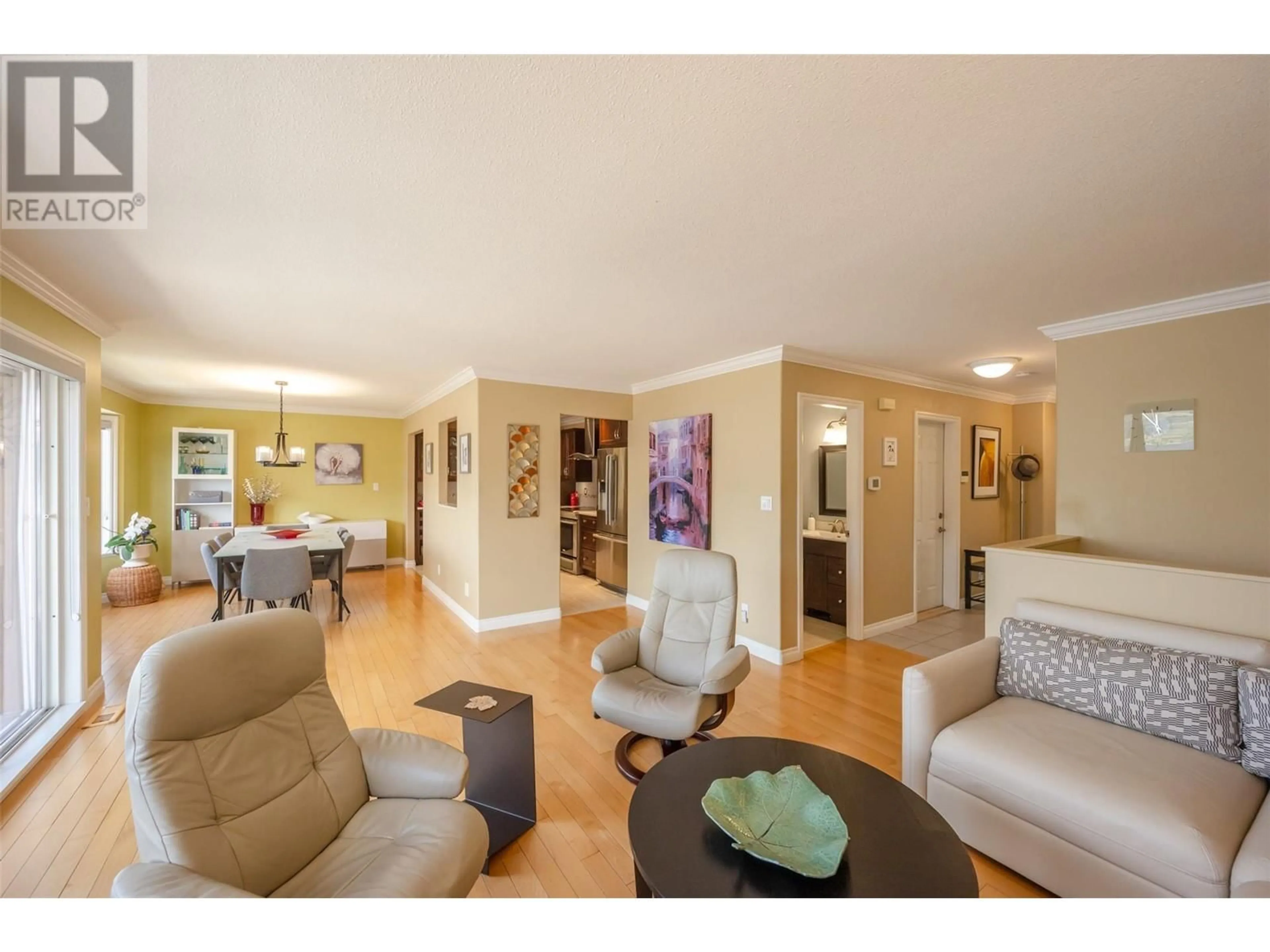 Living room with furniture, wood/laminate floor for 170 - 3948 FINNERTY ROAD, Penticton British Columbia V2A8P8