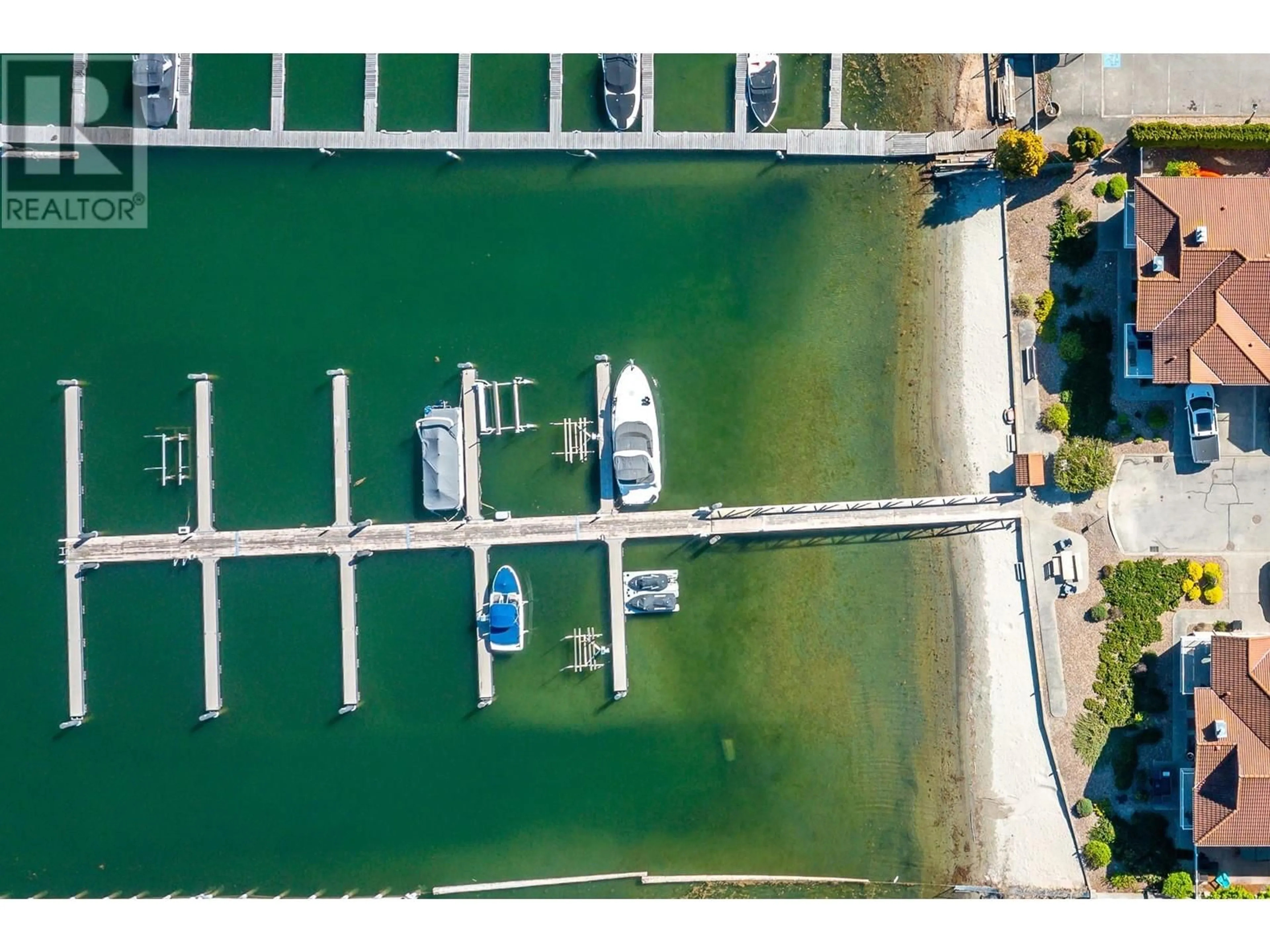 A pic from outside/outdoor area/front of a property/back of a property/a pic from drone, water/lake/river/ocean view for 15 - 7701 OKANAGAN LANDING ROAD, Vernon British Columbia V1T6Y5