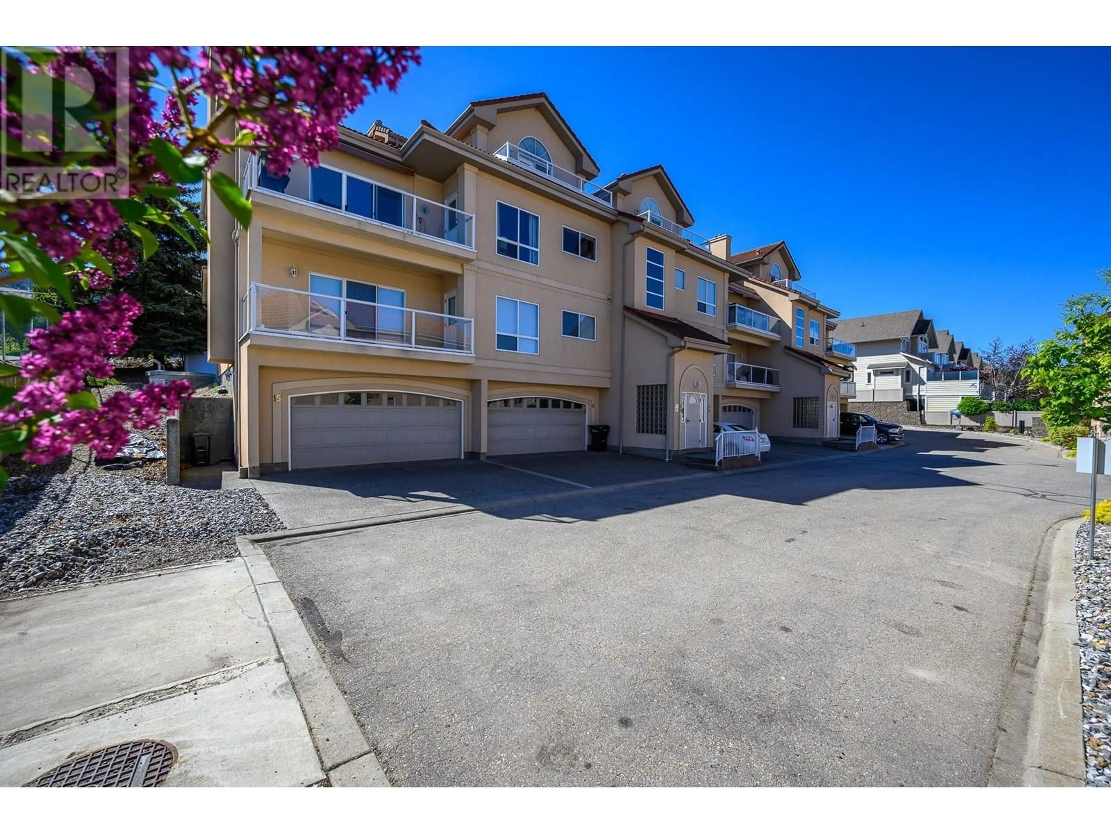 A pic from outside/outdoor area/front of a property/back of a property/a pic from drone, street for 15 - 7701 OKANAGAN LANDING ROAD, Vernon British Columbia V1T6Y5