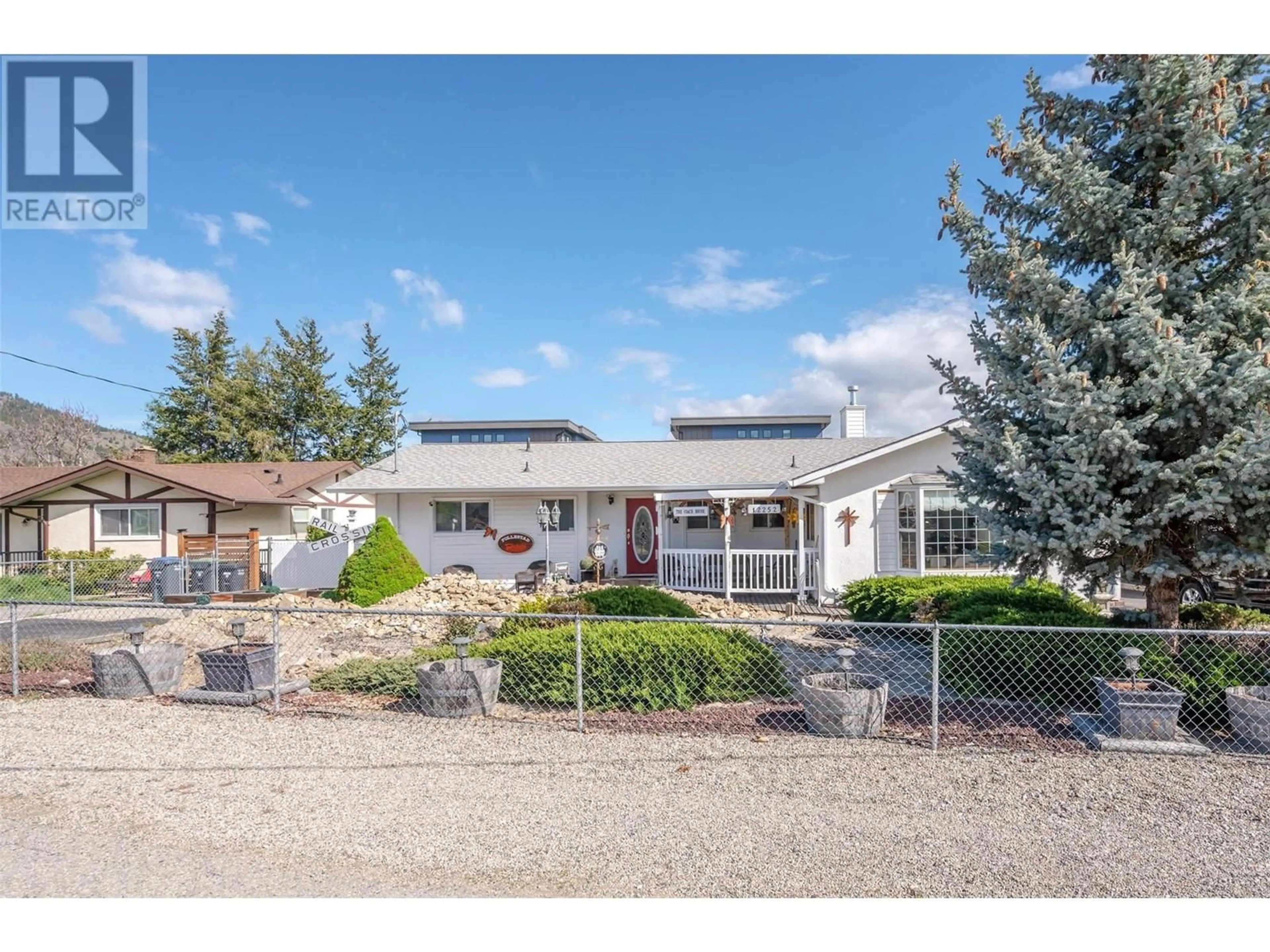 A pic from outside/outdoor area/front of a property/back of a property/a pic from drone, street for 12252 SAUNDERS CRESCENT, Summerland British Columbia V0H1Z0