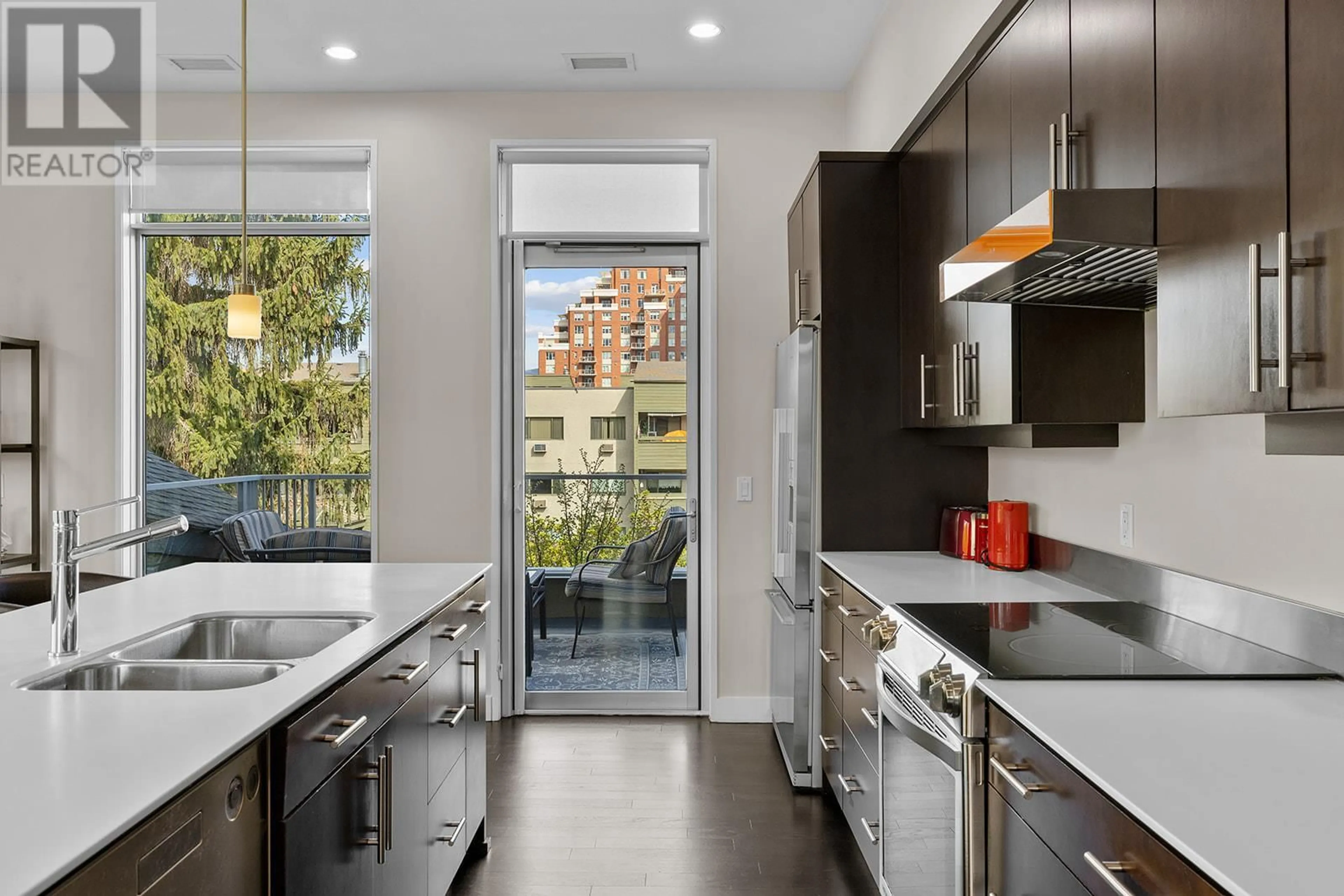 Contemporary kitchen, ceramic/tile floor for 309 - 1495 GRAHAM STREET, Kelowna British Columbia V1Y3B2