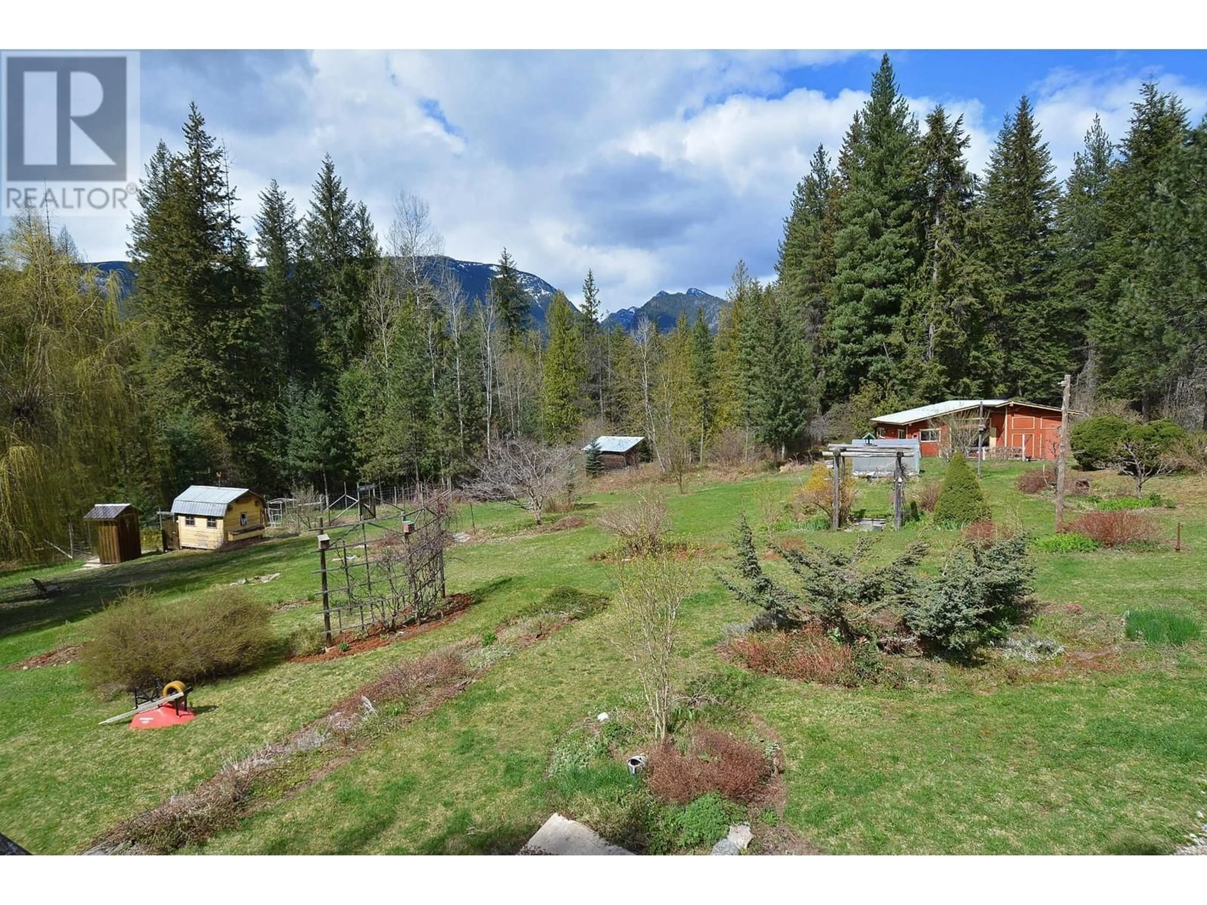 A pic from outside/outdoor area/front of a property/back of a property/a pic from drone, forest/trees view for 8481 6 HIGHWAY, Slocan British Columbia V1L2C0