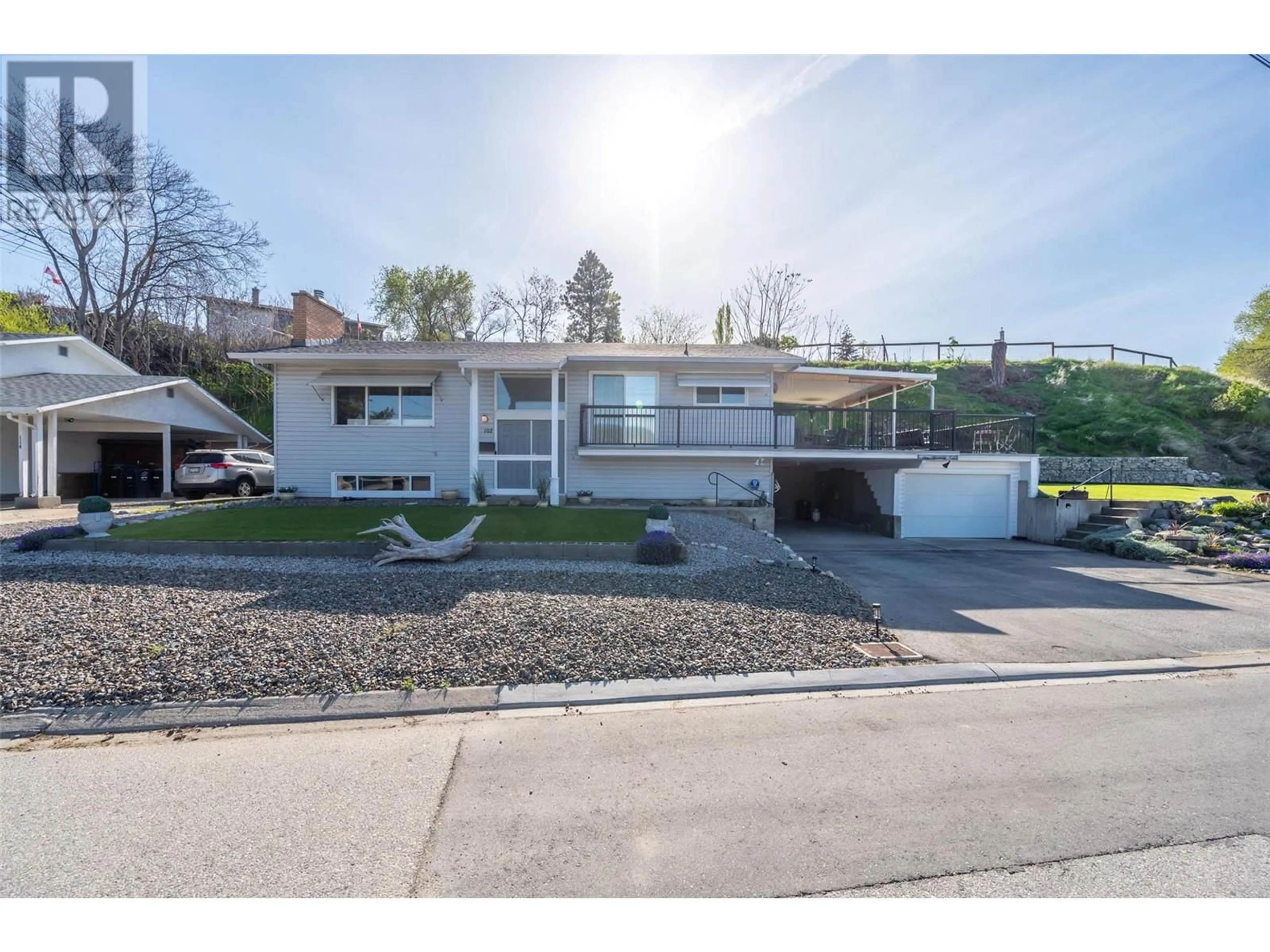 A pic from outside/outdoor area/front of a property/back of a property/a pic from drone, street for 102 PINEVIEW PLACE, Penticton British Columbia V2A3R4