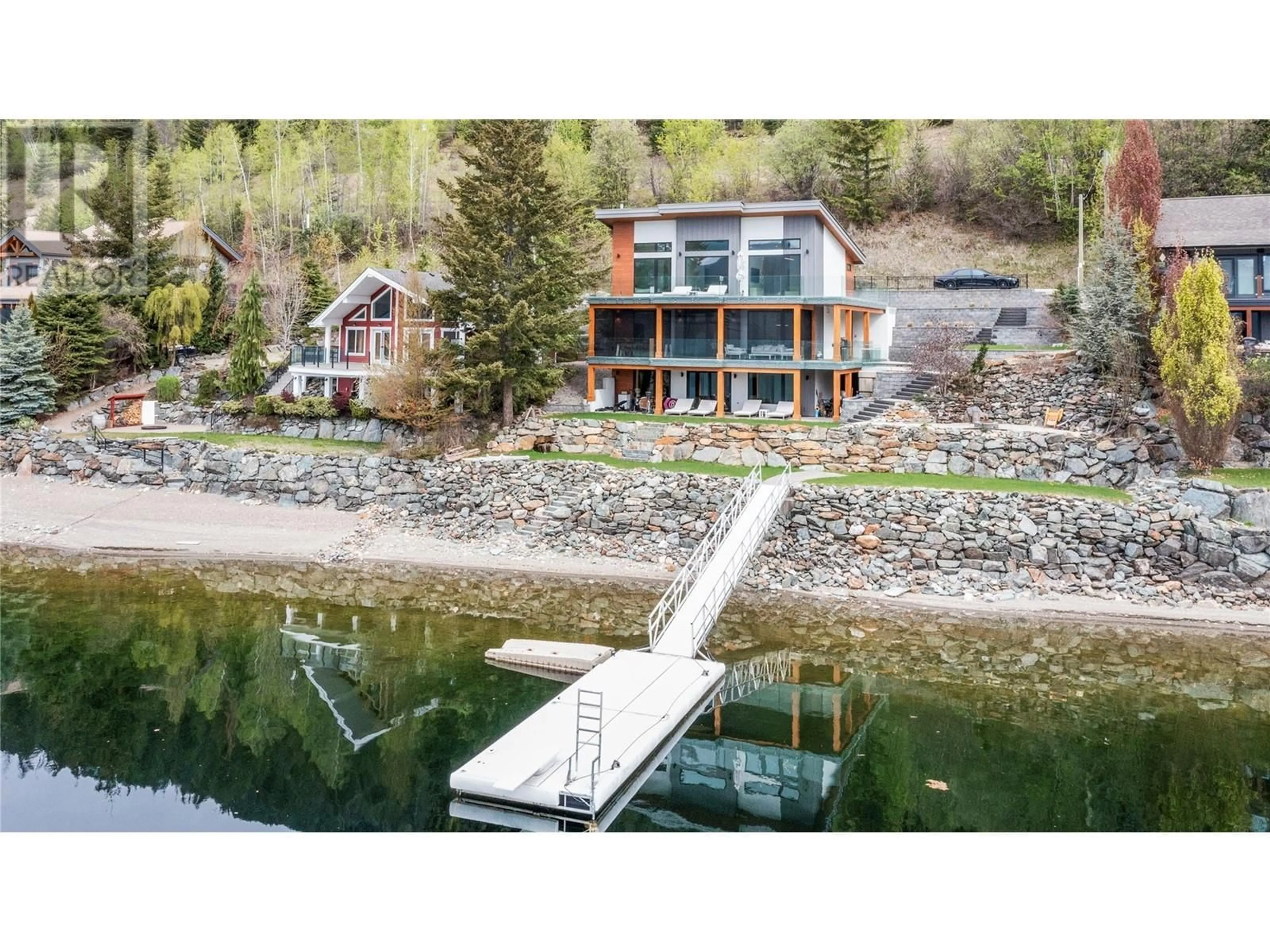 A pic from outside/outdoor area/front of a property/back of a property/a pic from drone, water/lake/river/ocean view for 6 - 8200 SQUILAX ANGLEMONT ROAD, Anglemont British Columbia V0E1M8
