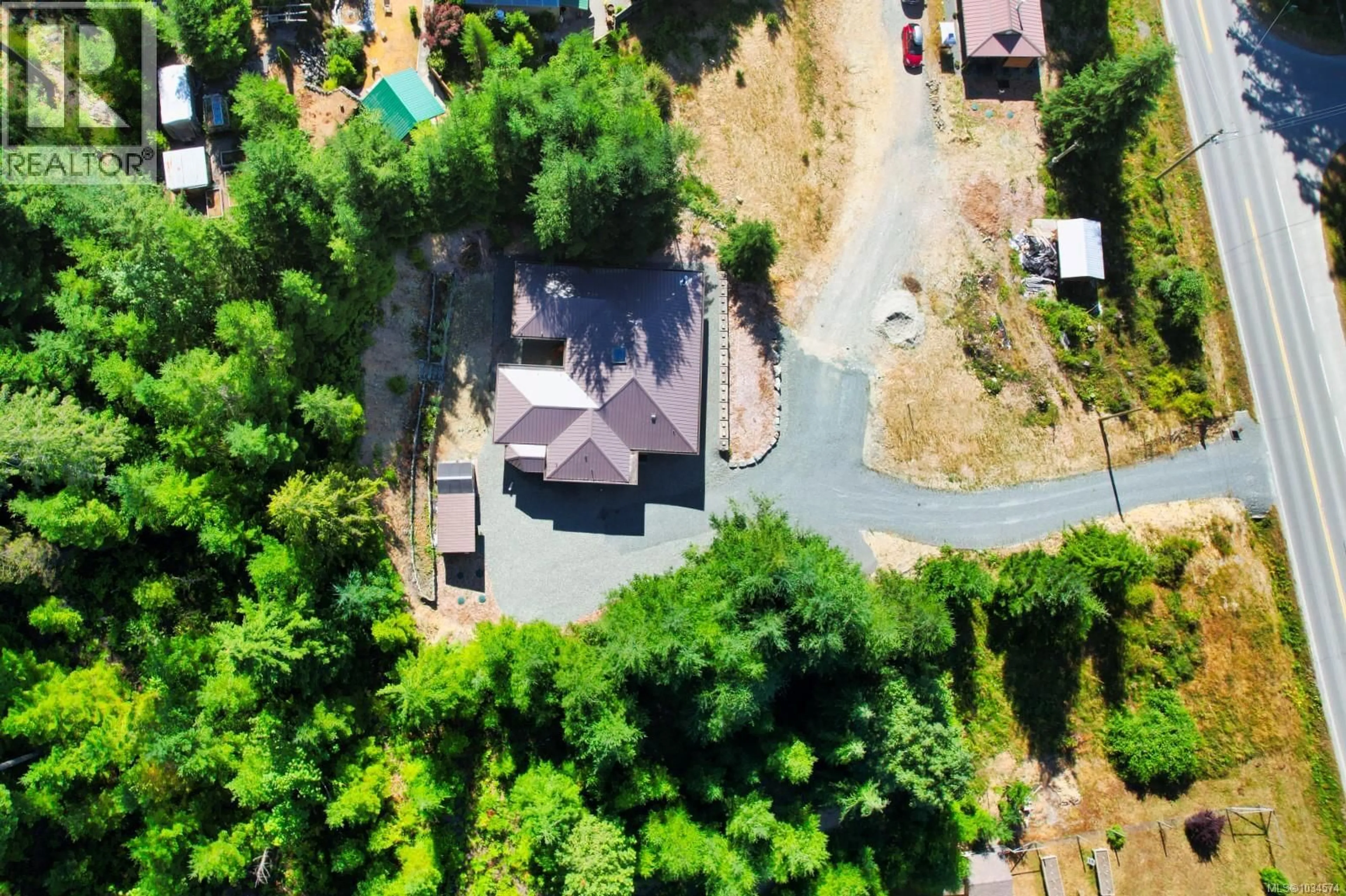 A pic from outside/outdoor area/front of a property/back of a property/a pic from drone, unknown for 9871 YOUBOU ROAD, Youbou British Columbia V0R3E1