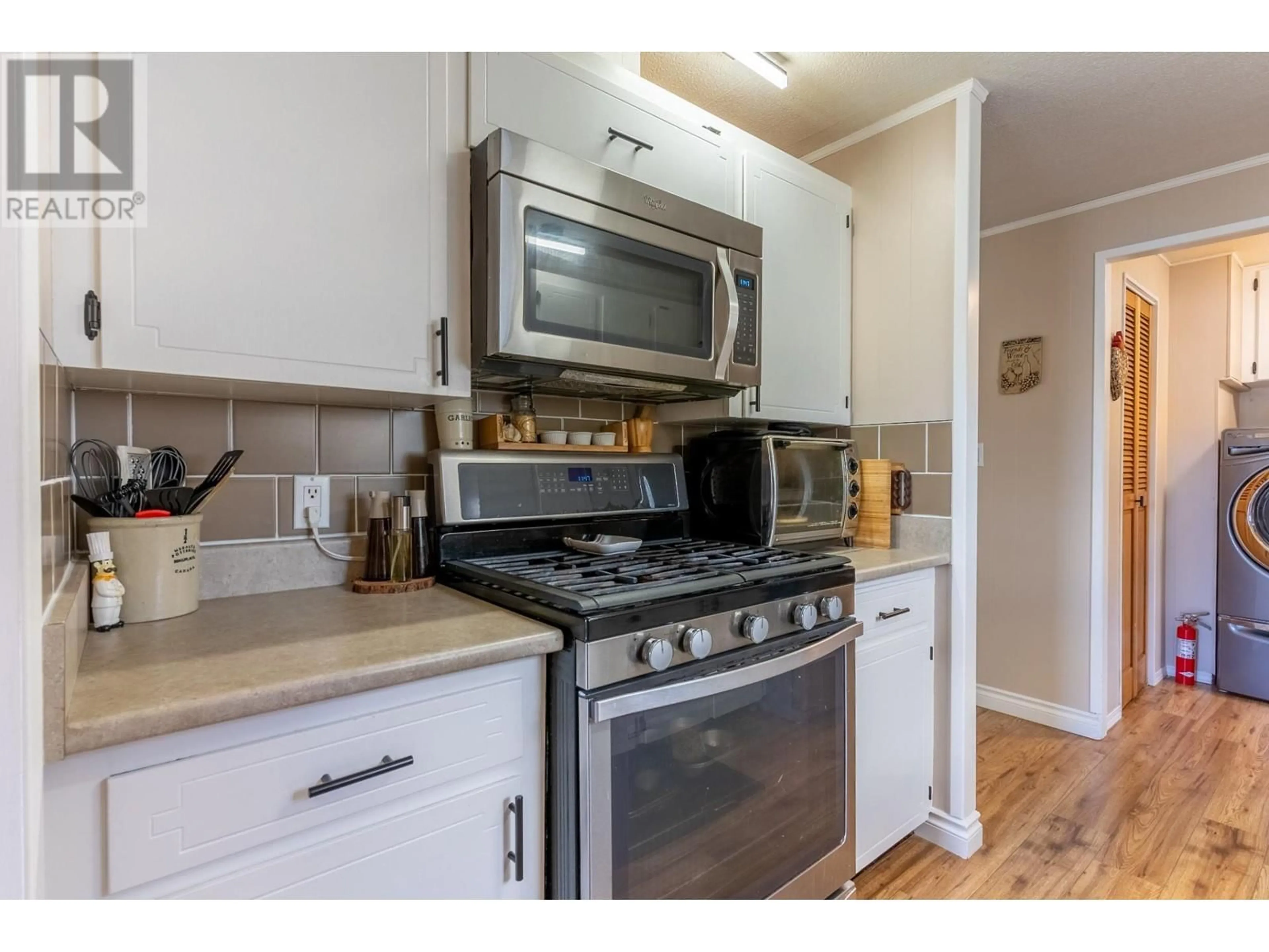 Standard kitchen, wood/laminate floor for 87 - 2400 OAKDALE WAY, Kamloops British Columbia V2B6W7
