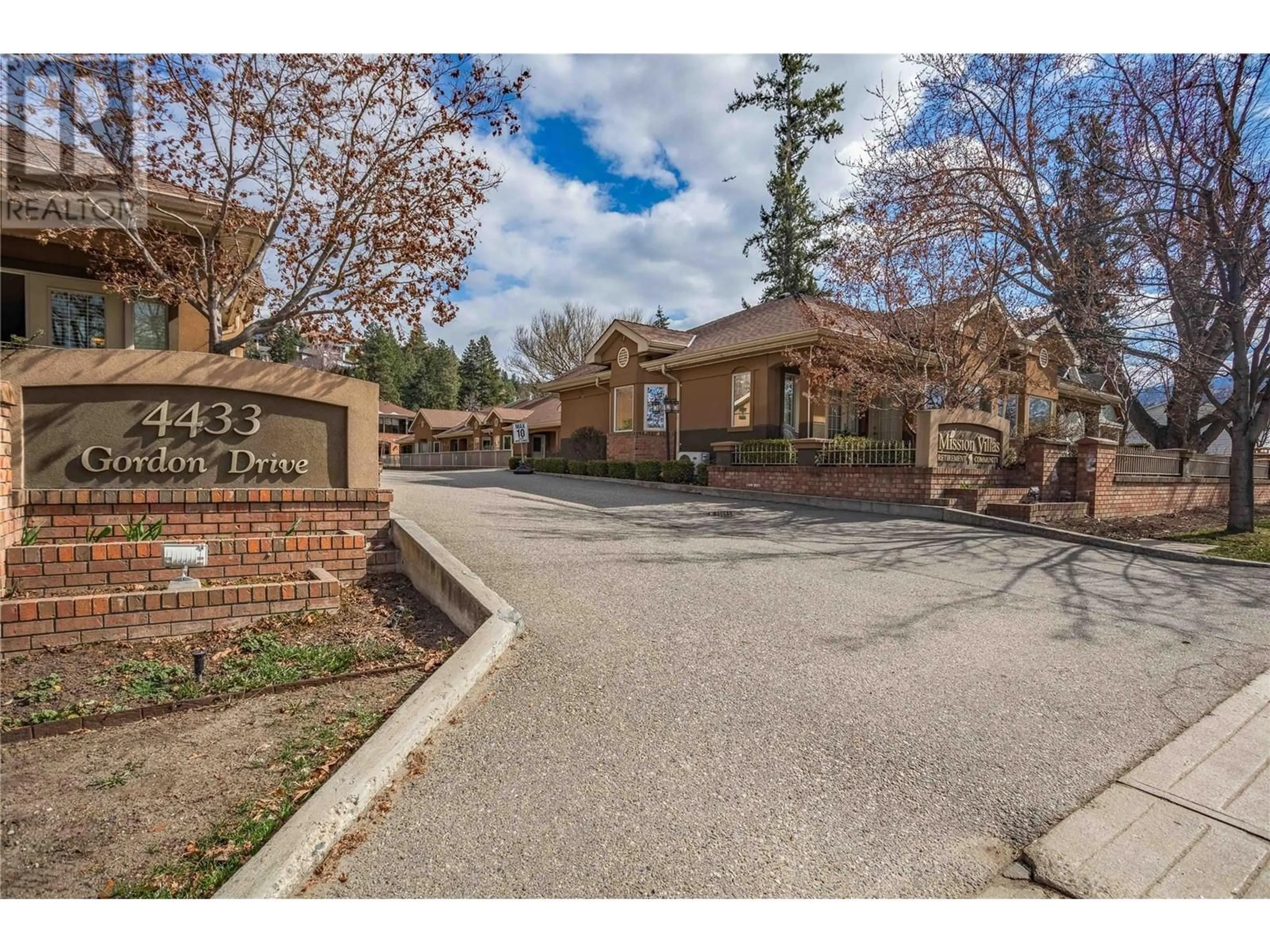 A pic from outside/outdoor area/front of a property/back of a property/a pic from drone, street for 117 - 4433 GORDON DRIVE, Kelowna British Columbia V1W1S9