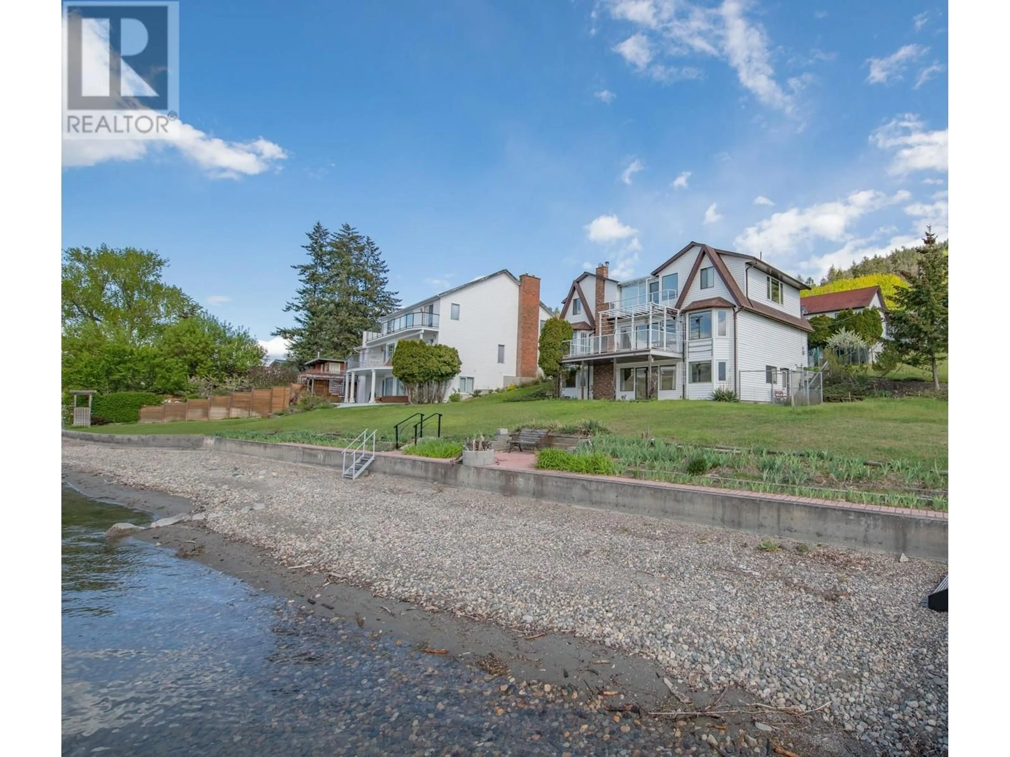 A pic from outside/outdoor area/front of a property/back of a property/a pic from drone, water/lake/river/ocean view for 8153 OKANAGAN LANDING ROAD, Vernon British Columbia V1H1J4