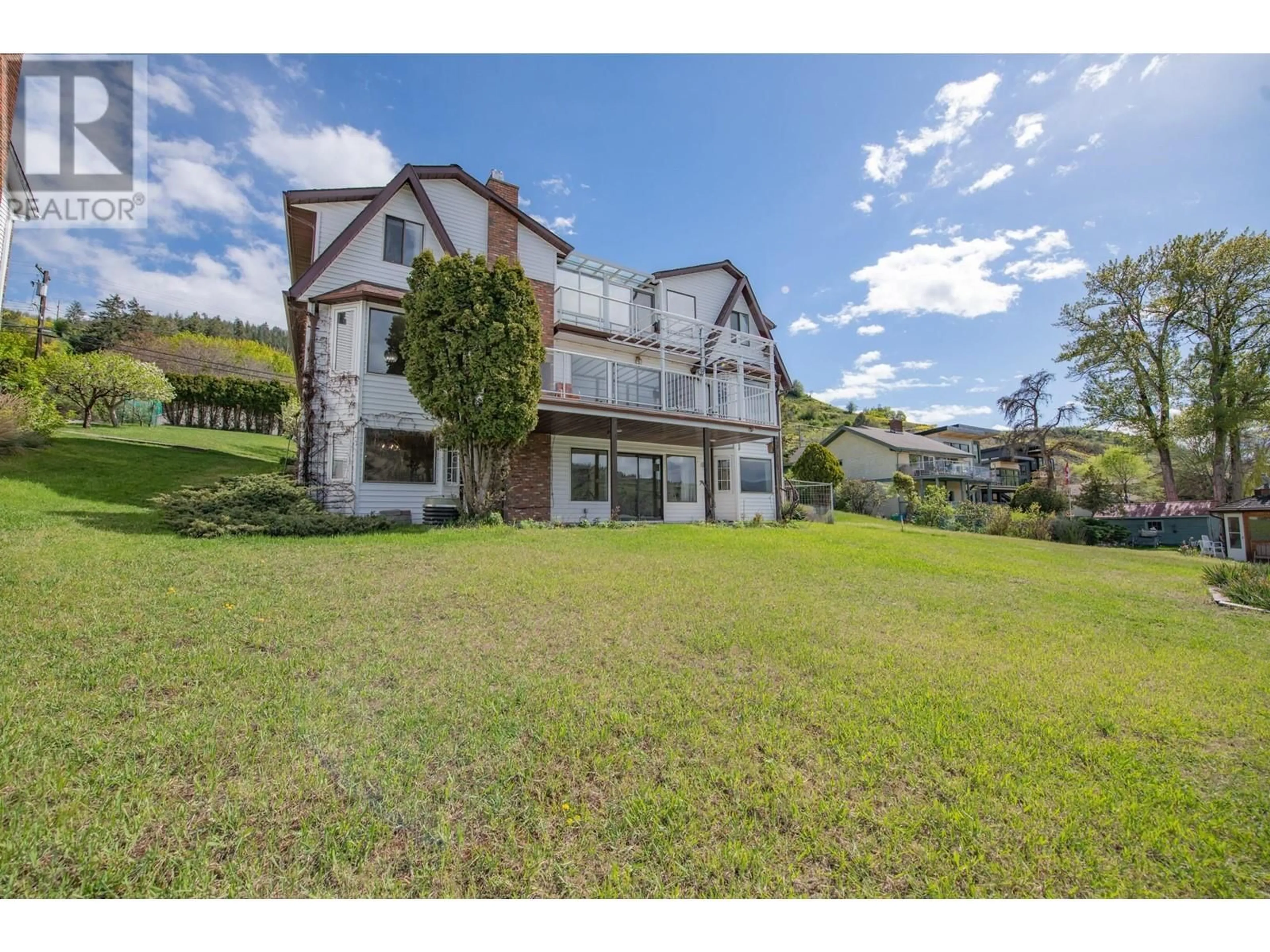 A pic from outside/outdoor area/front of a property/back of a property/a pic from drone, unknown for 8153 OKANAGAN LANDING ROAD, Vernon British Columbia V1H1J4
