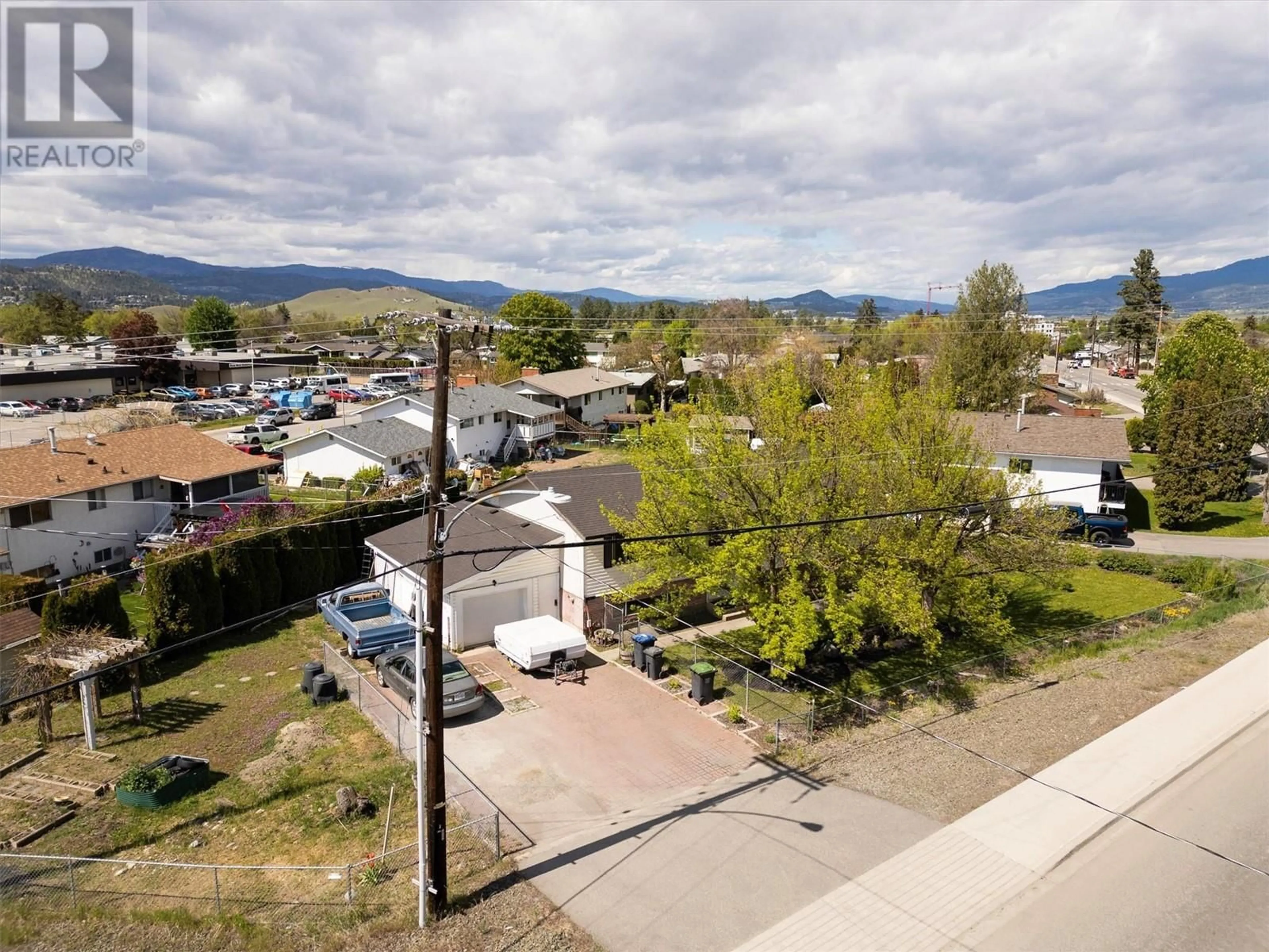 A pic from outside/outdoor area/front of a property/back of a property/a pic from drone, unknown for 620 RUTLAND  S ROAD, Kelowna British Columbia V1X3W1