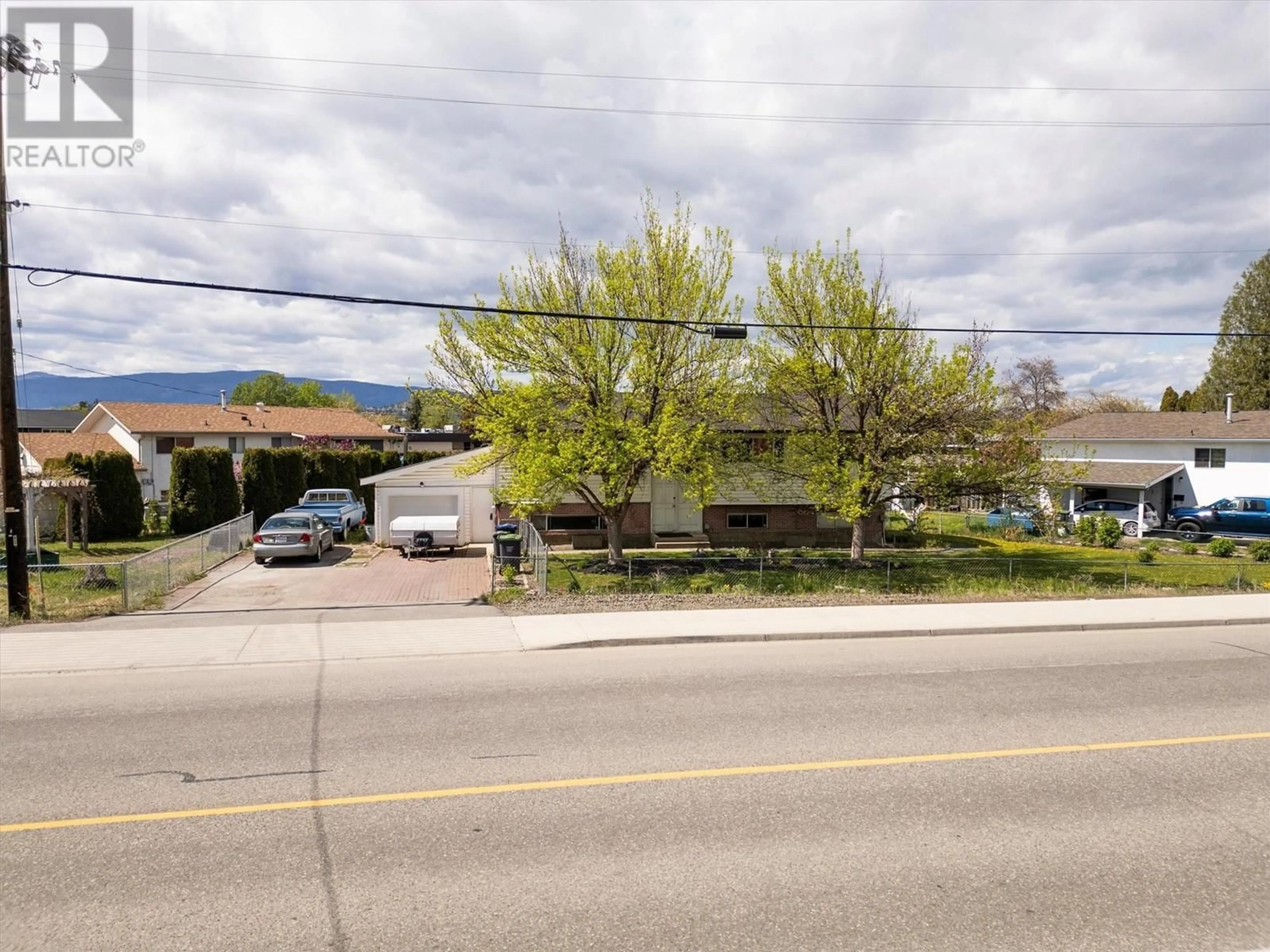 A pic from outside/outdoor area/front of a property/back of a property/a pic from drone, unknown for 620 RUTLAND  S ROAD, Kelowna British Columbia V1X3W1