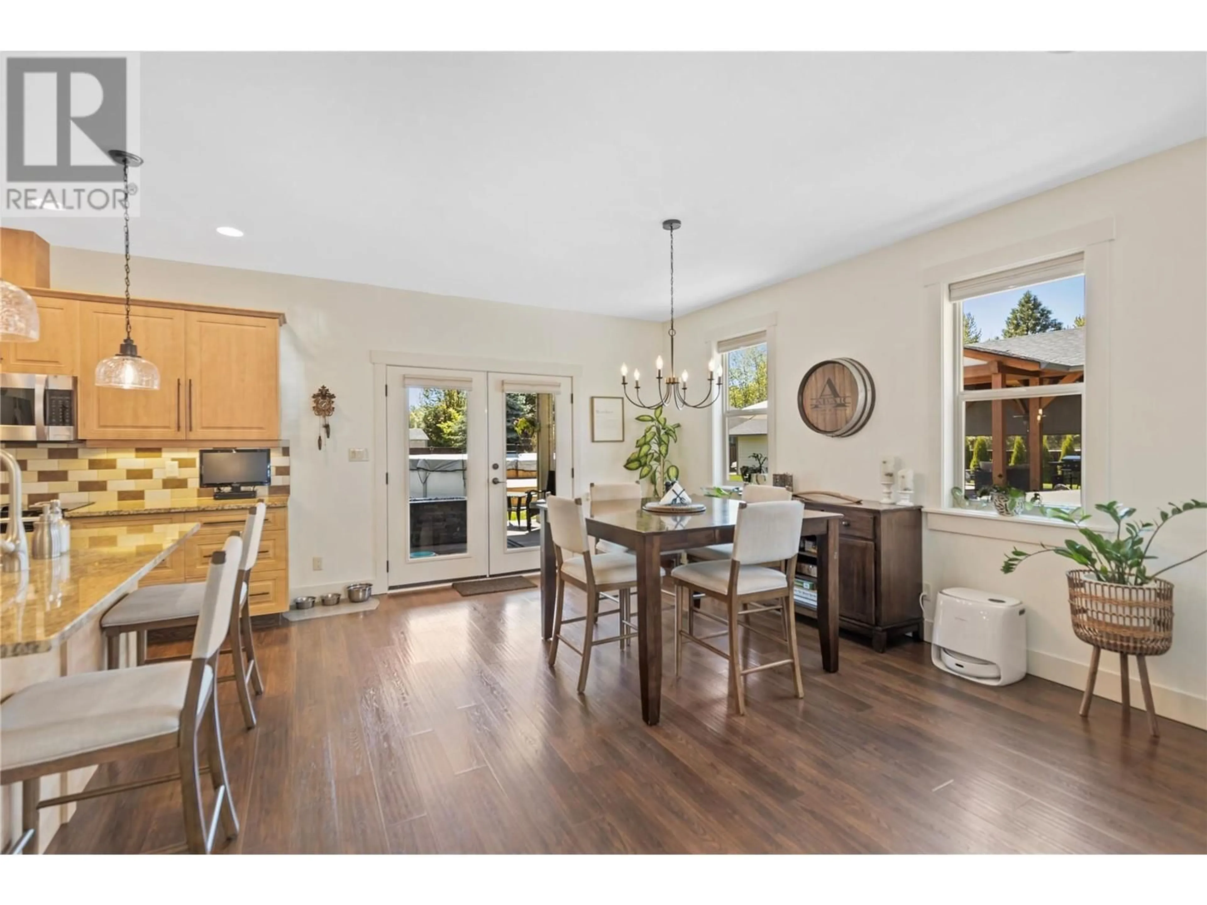 Open concept kitchen, wood/laminate floor for 4812 SPRUCE CRESCENT, Barriere British Columbia V0E1E0